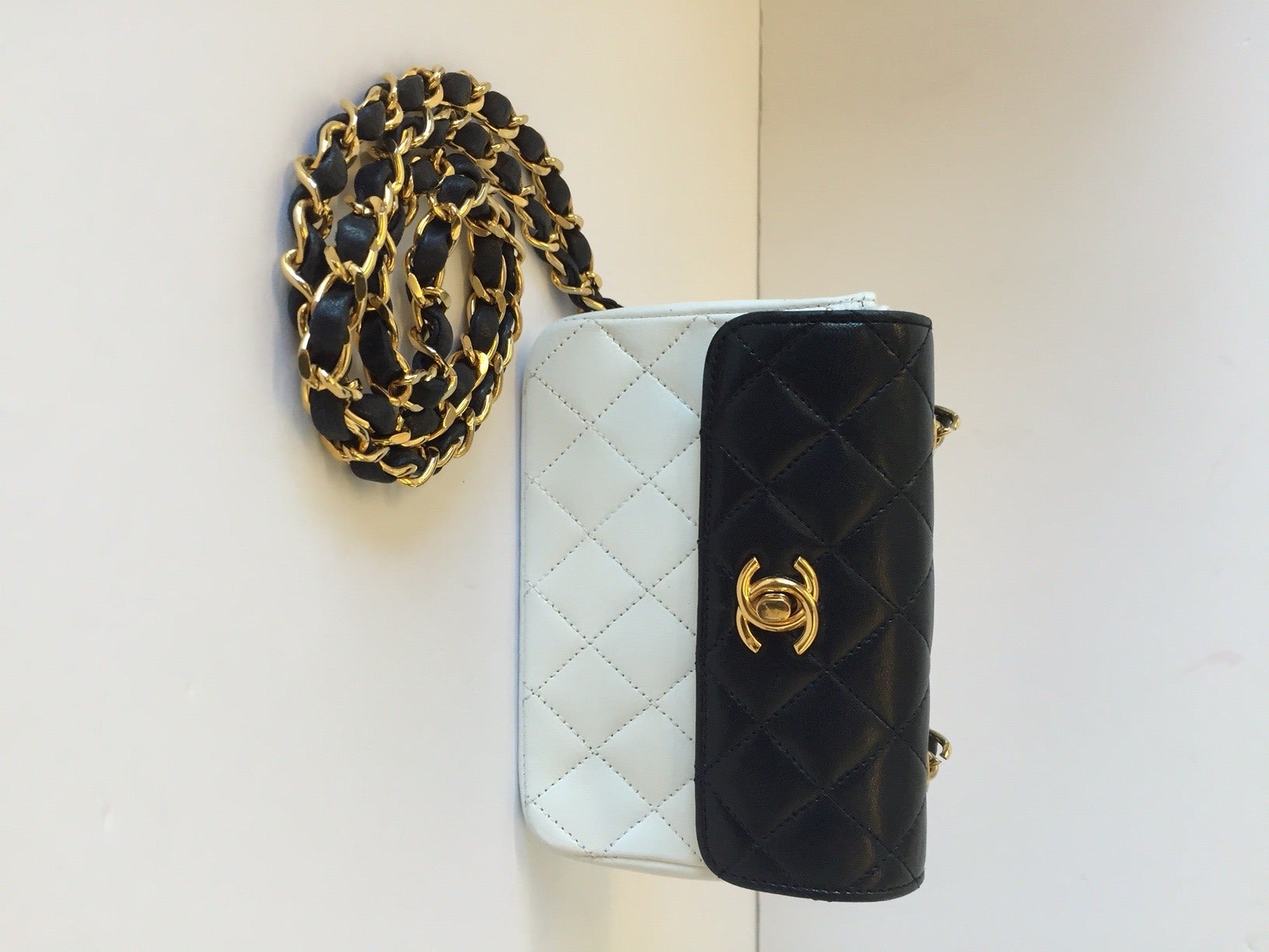 Brand: Chanel
Color: White/Black
Size: Mini

Bag Length: 6