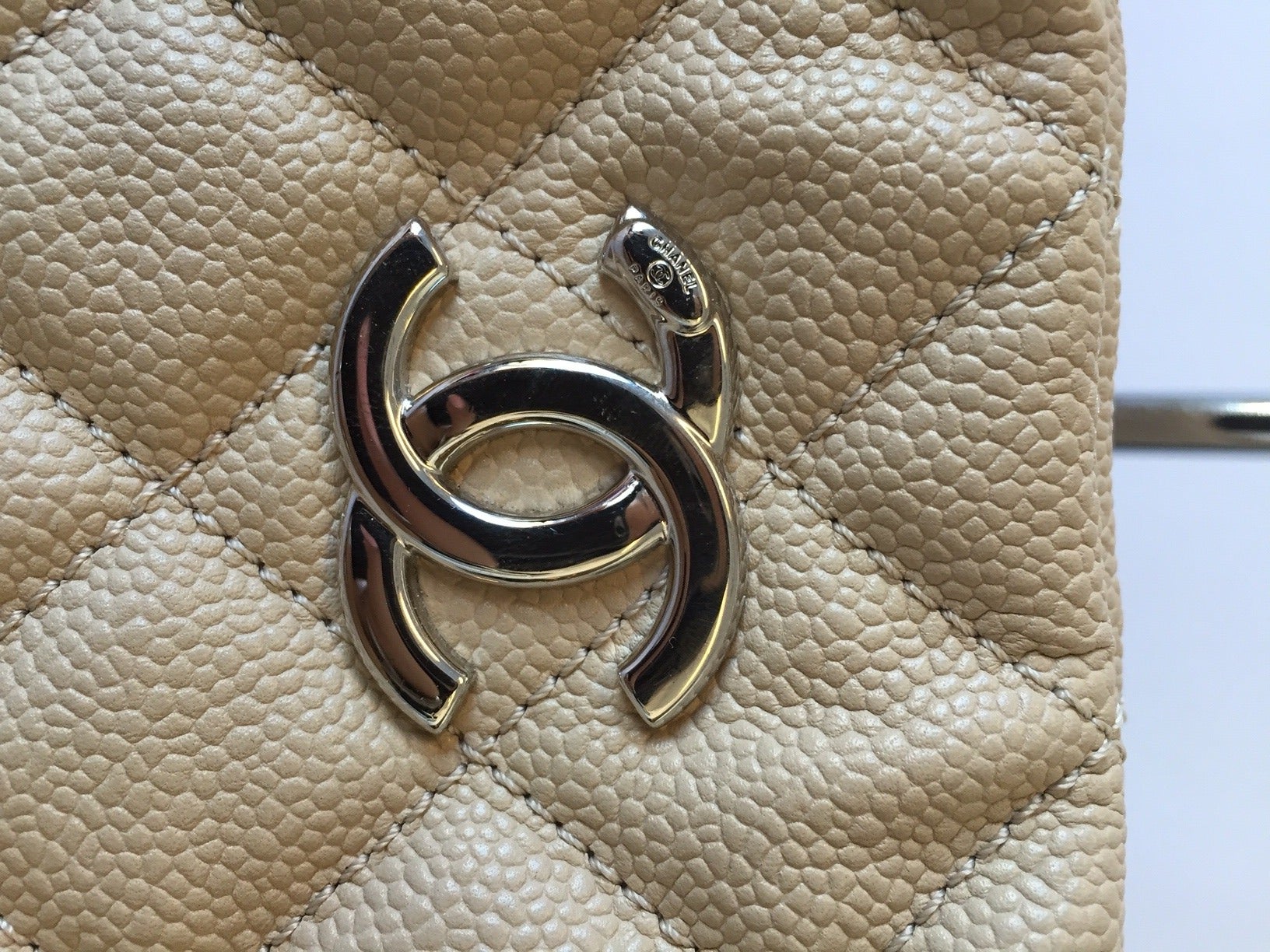Brand: Chanel
Manufactured: Italy 
Color: Beige 
Date Code: 1899960
Magnetic Closure

Bag Length: 15