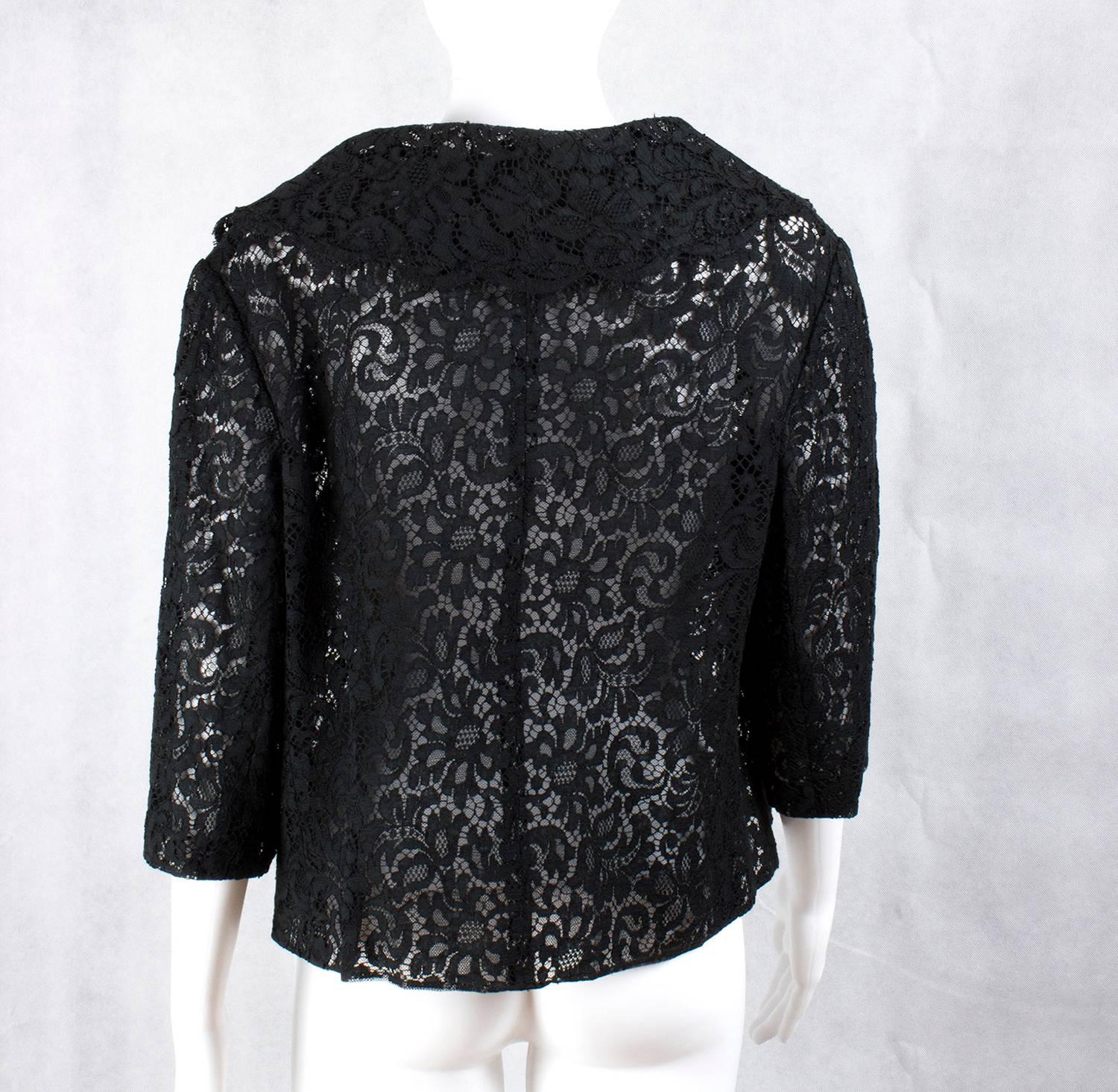 Elegant black lace jacket, 1960s

Size: no size, it seem to be 42-44 It , 10 UK, 6 US
Brand: tailored
Condition: Good Conditions, Some light signs of wear

Approx. Measurements:

- Sleeve's lenght: 37cm 
- Armpit to armpit (flat): 53 cm
- Total