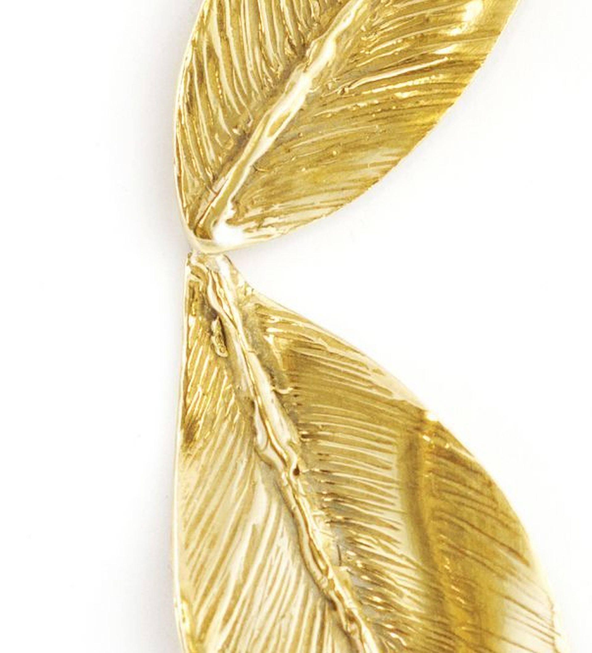 These earrings are handcrafted in Italy with a lost wax technique.

These leaves stand out with the amount of detail and shine that bounces off the surface. Giulia Barela jewels are characterized, stylistically, from strong sculptural effects. 
