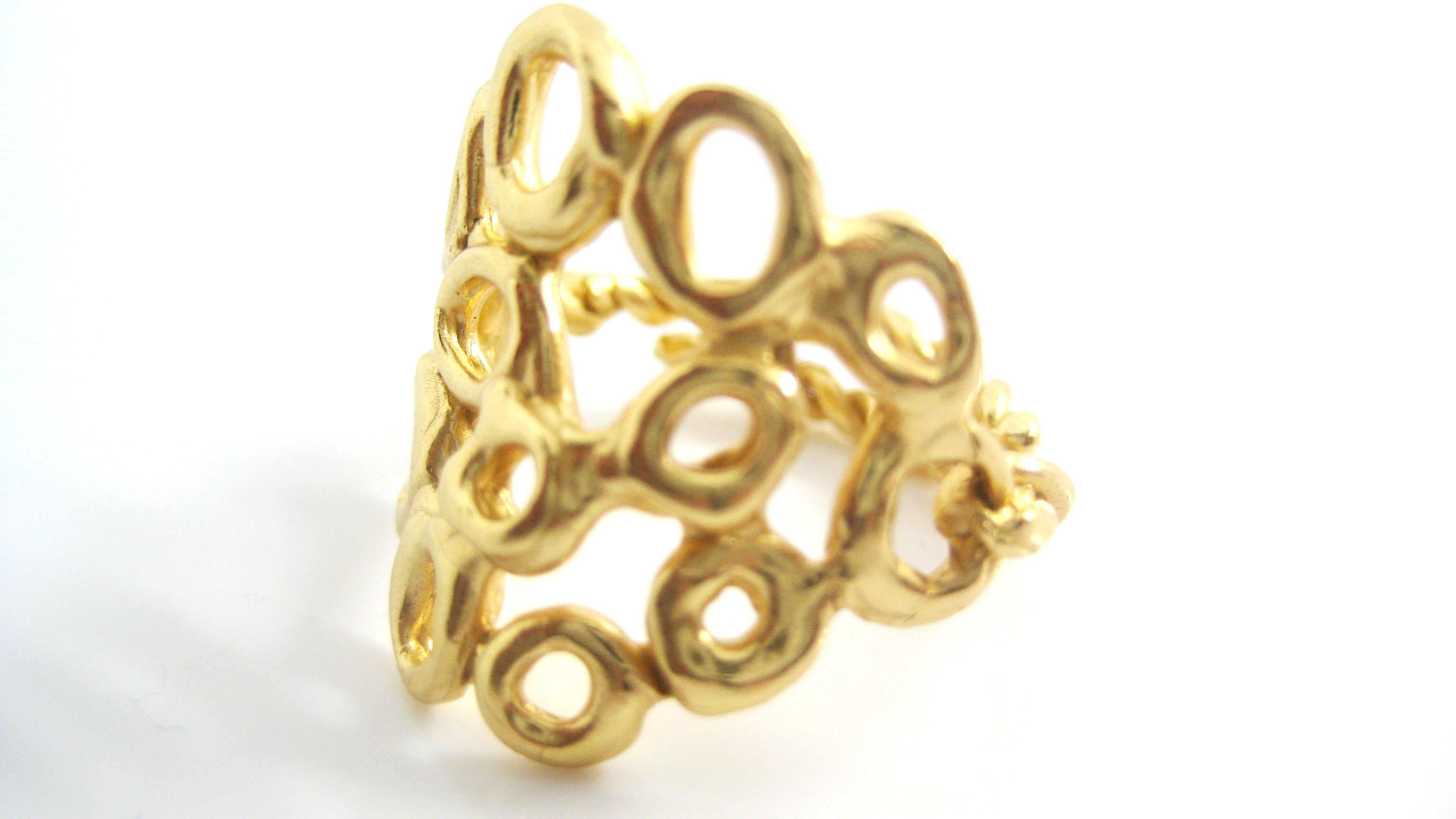 Giulia Barela Cloud Gold Plated Bronze Ring made in Rome

Sculpted uniquely, the result is a jewel that is light and appears untouchable. The surface is illuminated causing one to grasp the senses and let in new emotions. This ring may be graceful