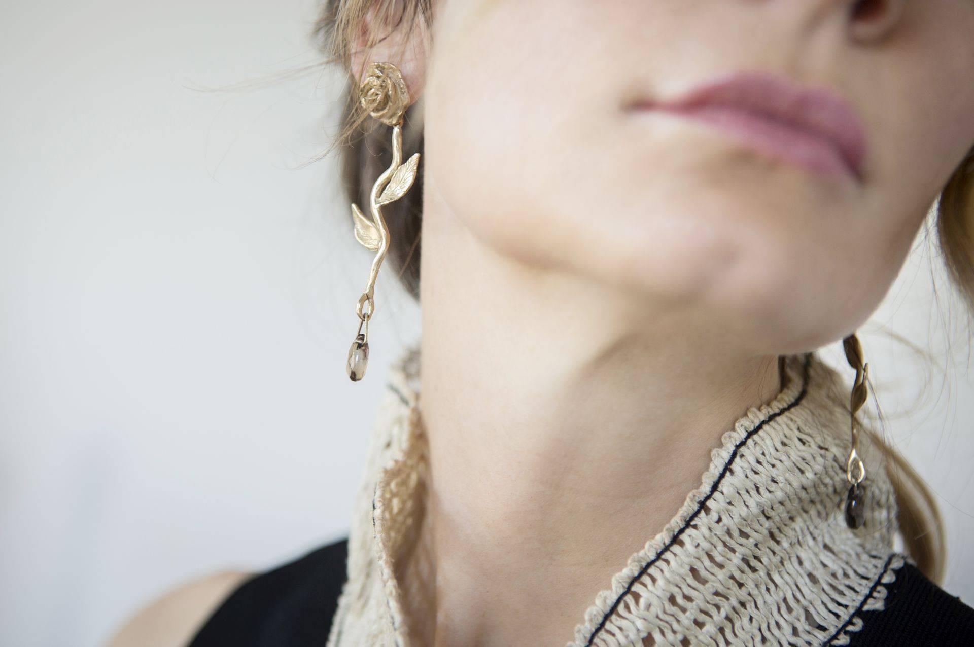 Giulia Barela Seeds Gold Plated Bronze Earrings made in Rome

Vitality is brought to these earrings through the inspiration of nature and especially light. These flowers beautifully blossom right out of the ear. The immense detail is made possible