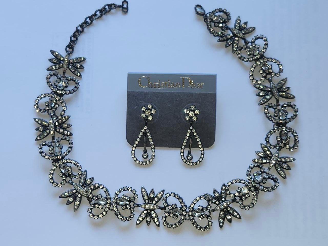 Vintage John Galliano for Christian Dior Haute Couture Necklace and Earrings Set
Circa 1997
Metal, Crystals
Dior Stamp
Total Length (with adjustable chain is 43 cm)
Width 2.5 cm
Earrings 4 cm
Excellent condition