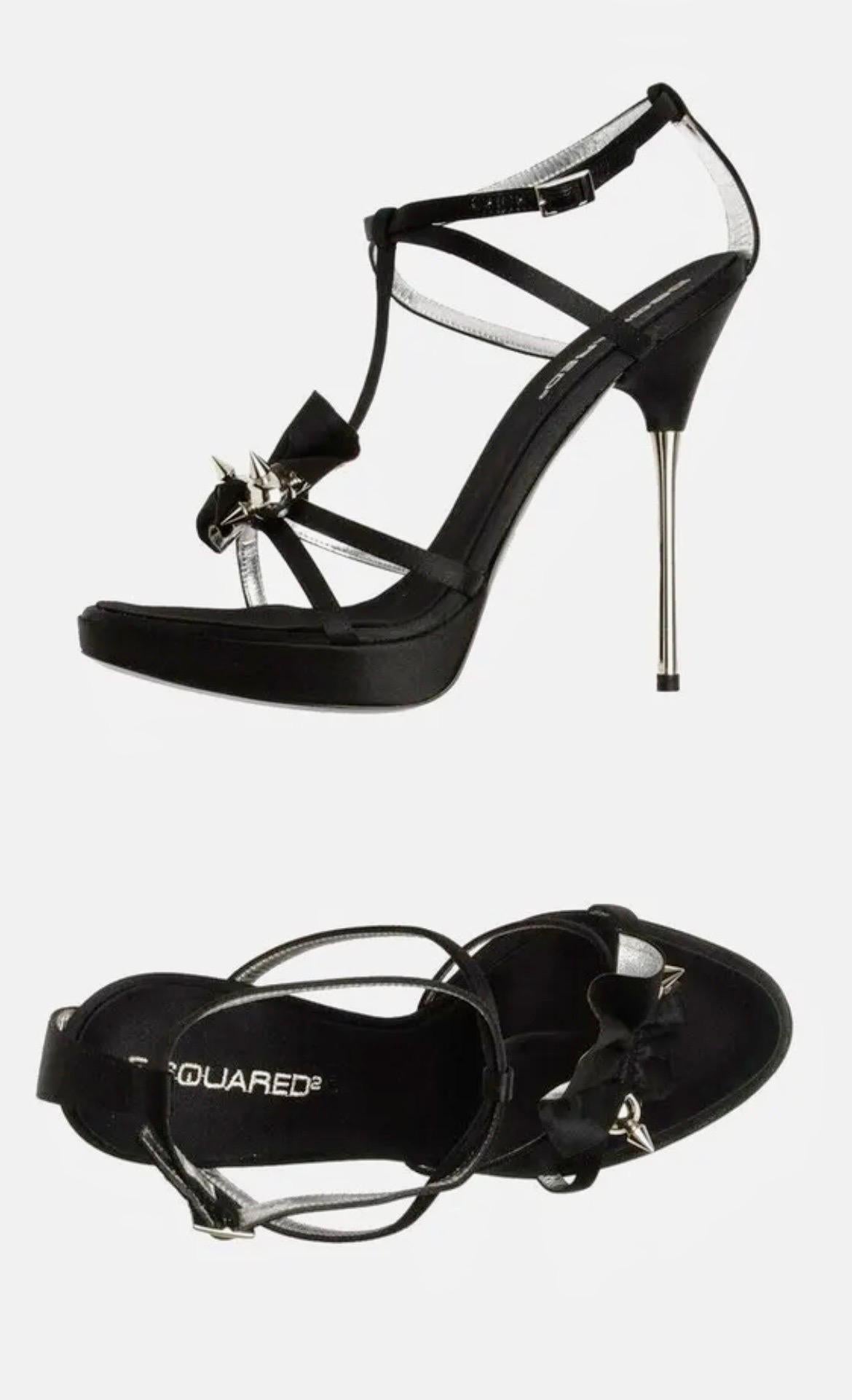 F/W 2008 Dsquared2 
Fetish Metal Stiletto Heel Platform Sandals 
Black satin, metal spikes, T-strap, silver leather lining, leather sole.
IT size 38 - US 8
Heel 5