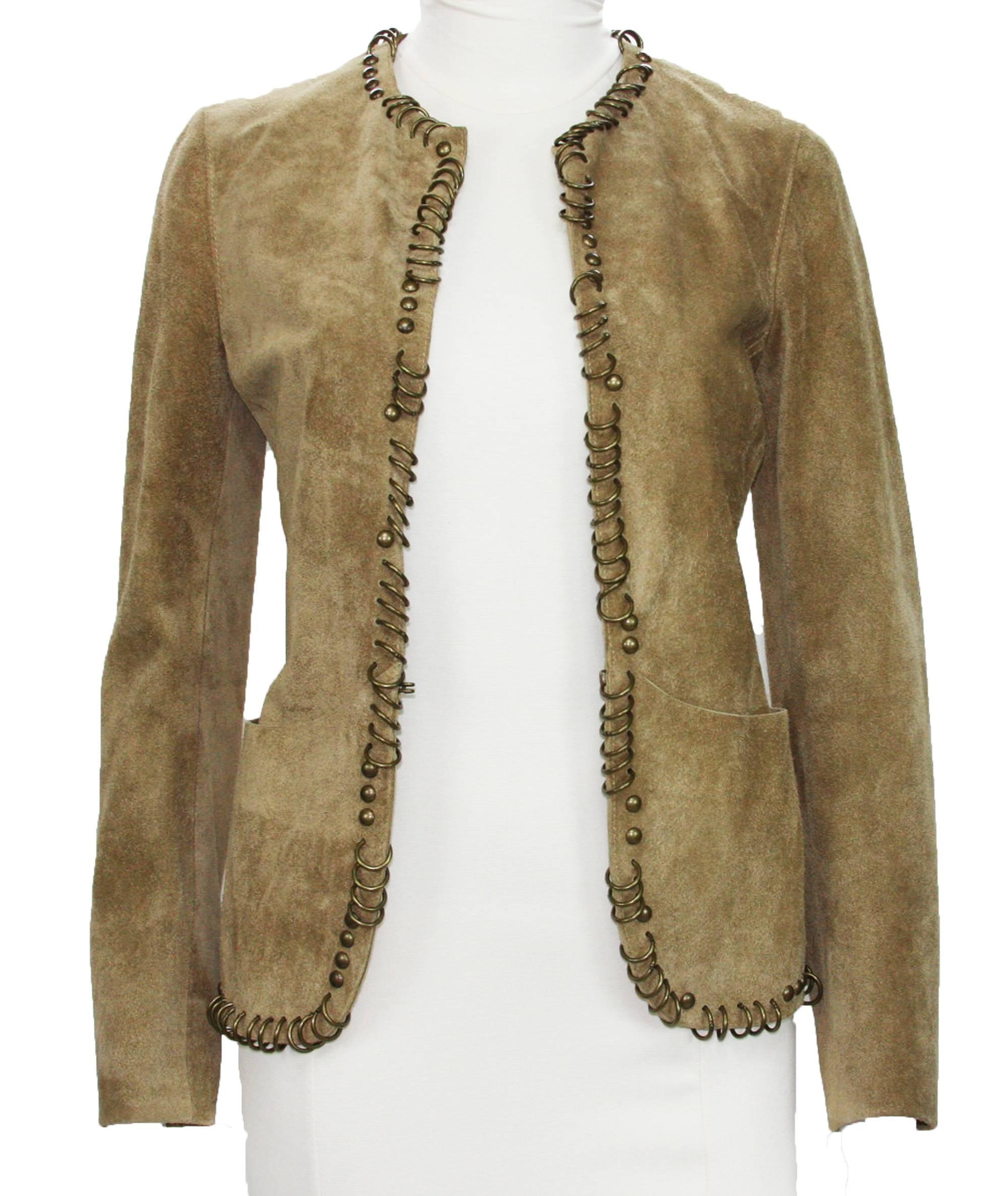 New Tom Ford for Yves Saint Laurent Suede Jacket
2002 Collection
Designer Size 36 - US 2
Color - Beige
Embellished with Brass Ring and Studs
Features Patch Pockets at Hem
One Hook and Eye Closure
Measurements Flat: Length - 24 inches, Sleeve - 26,