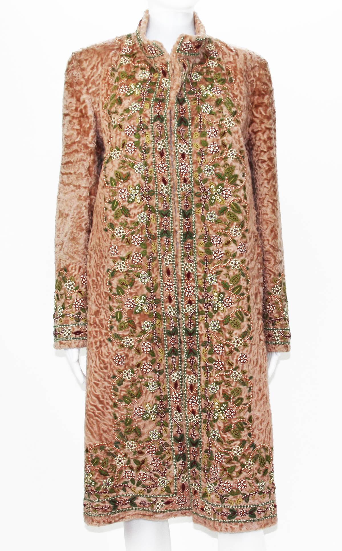 Rare OSCAR DE LA RENTA COUTURE Fur Embellished Coat
F/W 2002 Collection
100% Broadtail Swakara
Color - Peach
Beaded & Embroidered
Fully Lined
Two Side Pockets
Open Style, No Closure
Measurements: Length - 40 inches, Sleeve - 25 inches, Bust - 40