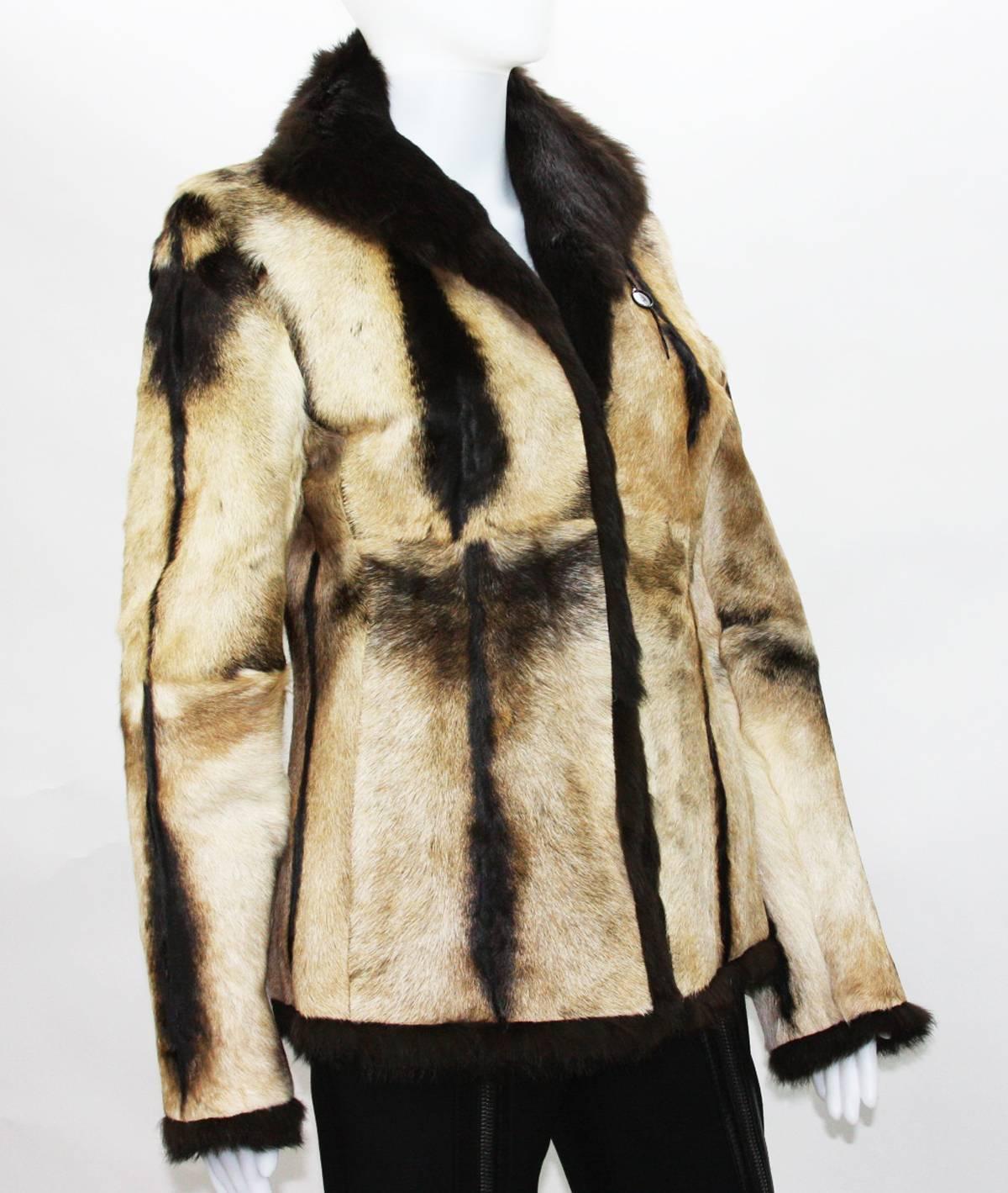 Tom Ford for Gucci Reversible Beige Fur Jacket
F/W 1999 Collection
Italian size - 40
Beige Color Calf Hair Reverse to Brown Color Rabbit Fur.
Split Pockets at Sides.
Measurements: Length - 26 inches,  Sleeve - 25 inches, Waist - 32 inches.
New with