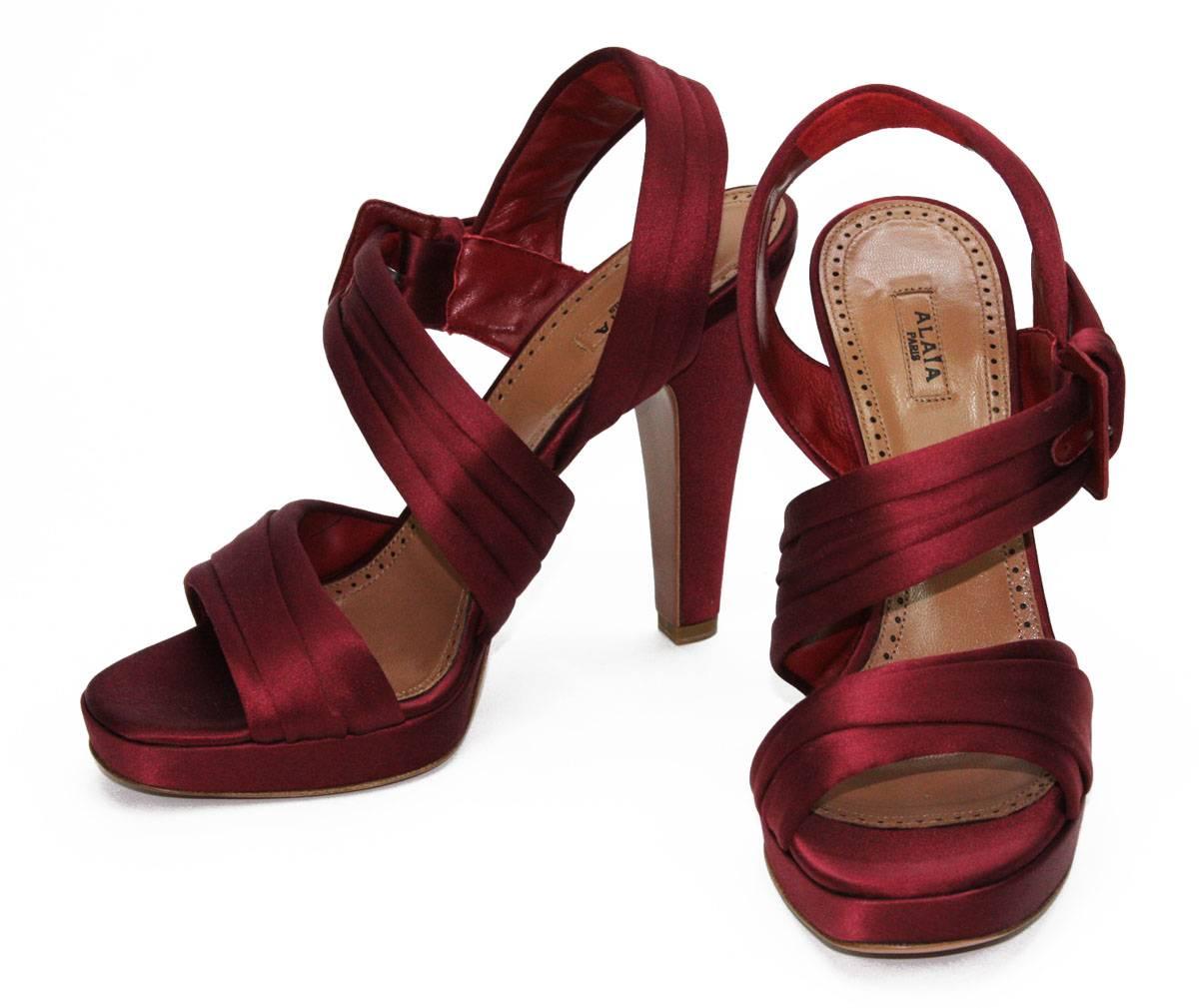 New AZZEDINE ALAIA Satin Shoes Sandals
Color: Deep Burgundy
Italian size 39.5 or US 9.5
Burgundy Satin & Red Leather Lining
Red Leather Side Buckle Closure
Platform - 3/4 inches
Heel - 5 inches 
Leather sole and insole
Retail $980.00
Made in