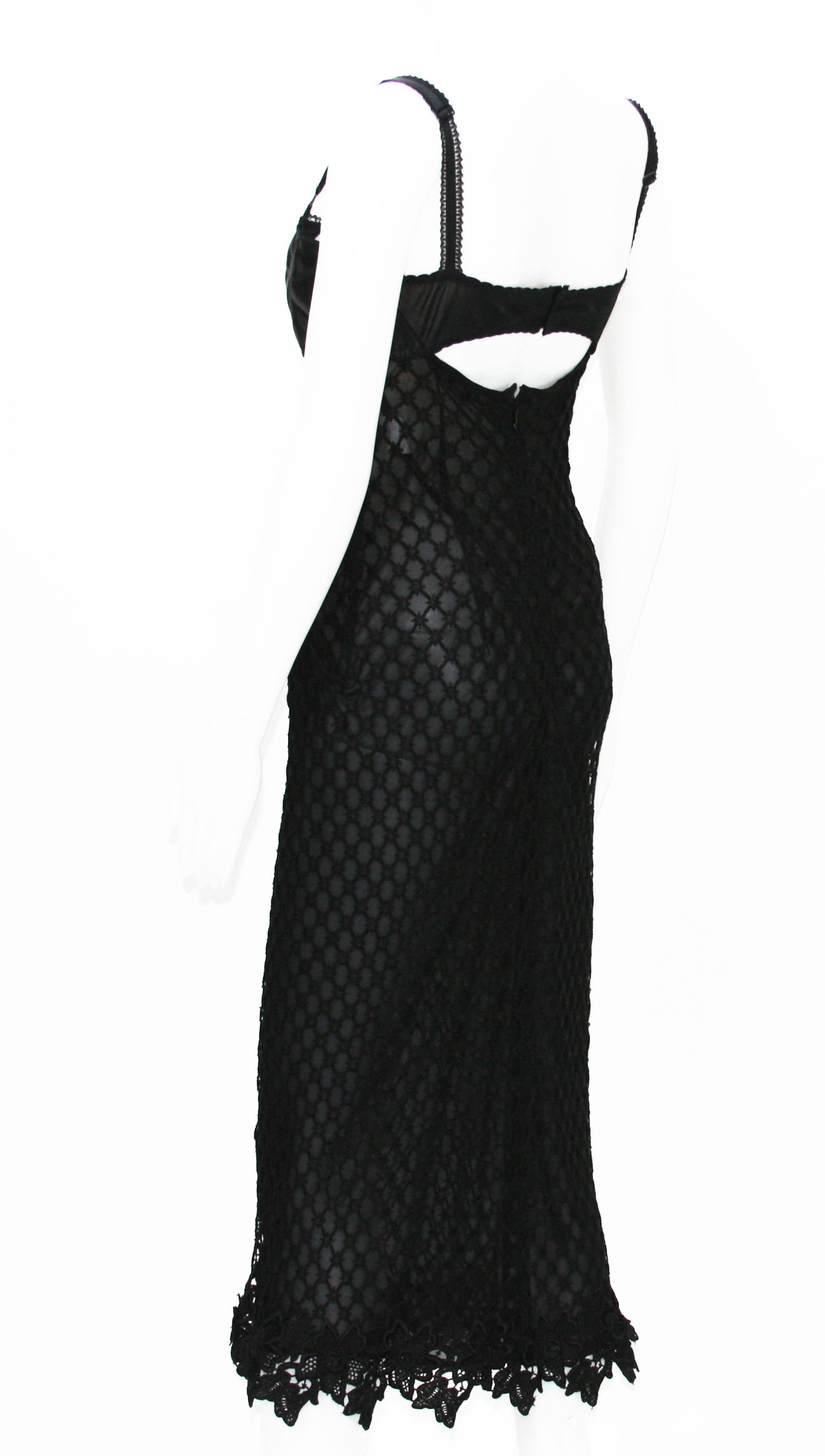 DOLCE & GABBANA Super Sexy Bustier Lace Dress
Italian Size - 44
Black Knitted Stretch Lace, Black Sheer Lining
Measurements for the dress approx. : bust - 37