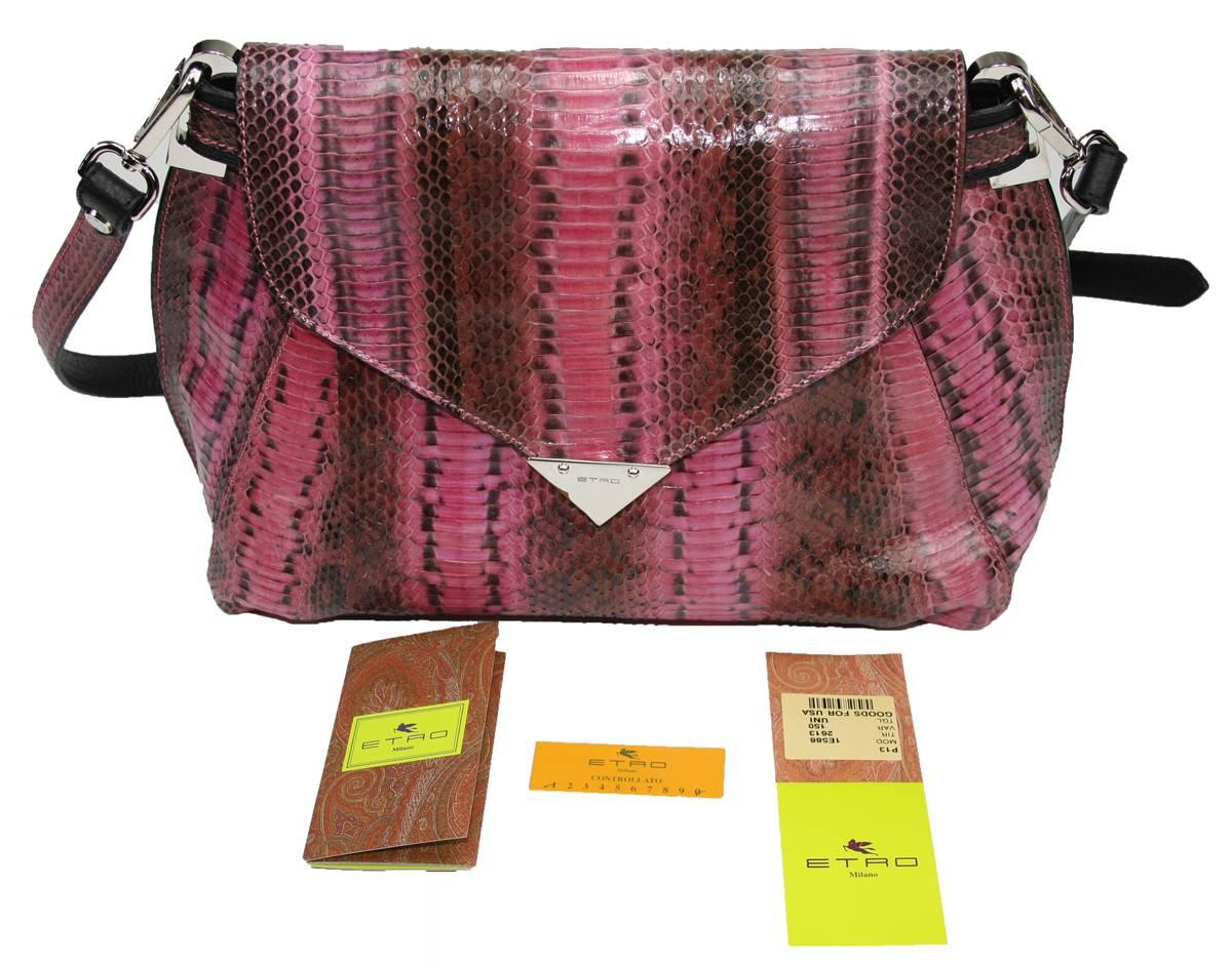 New ETRO Cornelia Runway Collection Clutch
100% Water Snake Leather
Colors – Pink, Brown, Black.
Detachable Shoulder Strap – from 38” drop to a 43”.
It Can Be Used as a Clutch, Shoulder Bag or a Cros Body Bag.
Magnetic Closure Button
Fully Lined,