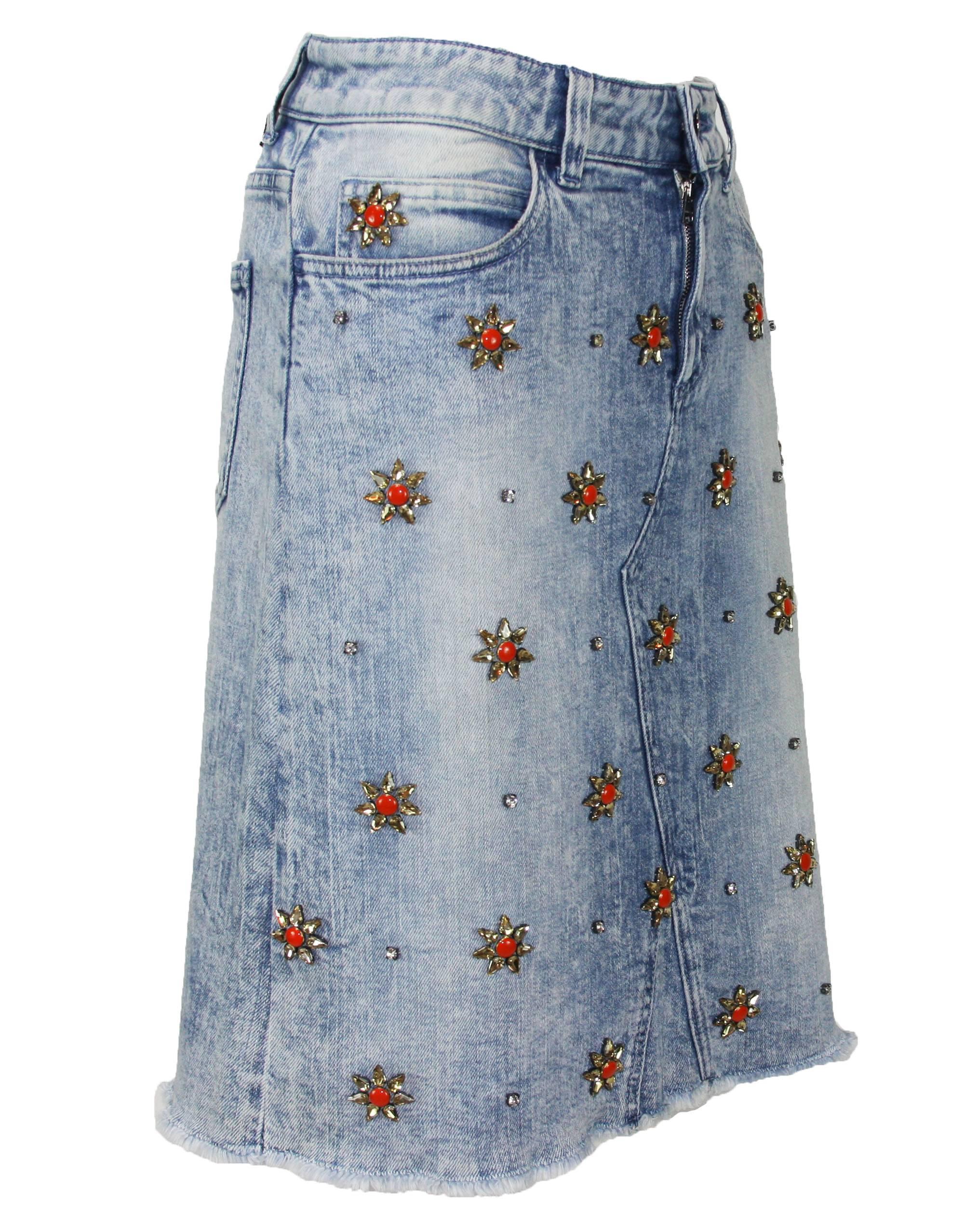 New GUCCI Crystal-Embellished Stretch Denim Skirt

Gucci has Recreated a Popular Denim Skirt that was Designed by Tom Ford in 1999.
Orange and Yellow Flower shape Crystal-Embellished
Bleach washed stretch denim
98% Cotton, 2% Elastane
Gucci Embossed