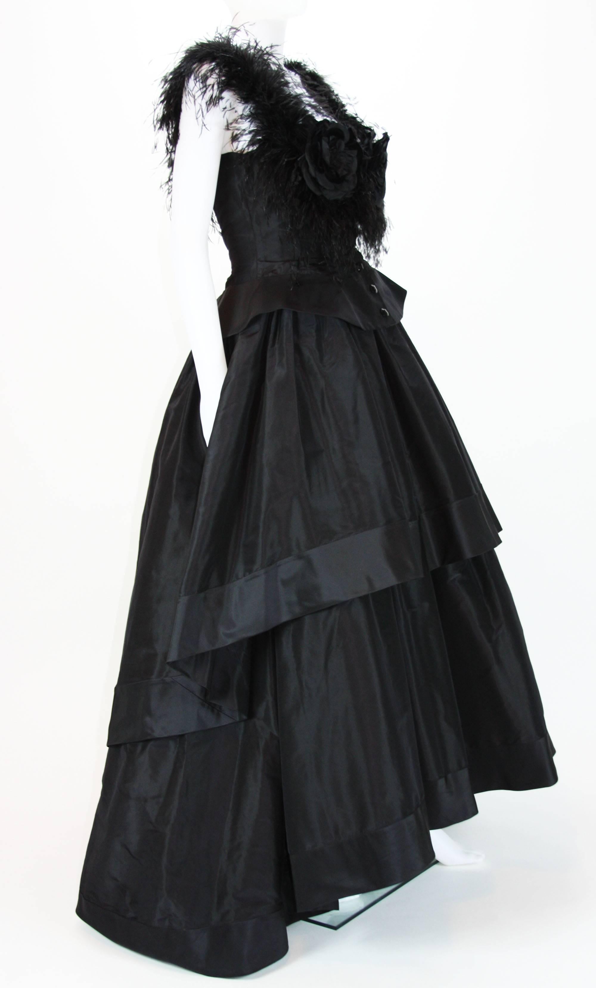 Valentino Boutique Black Ball Gown
No label size (waist 30", bust 36")
Feathers, Taffeta silk.
Brand New Condition.