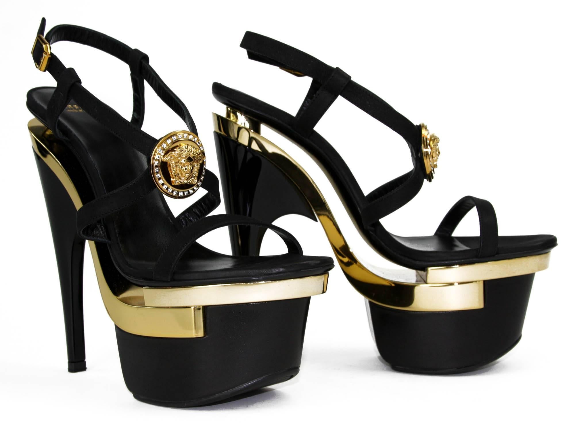 New Versace Triple Platform Strap Sandals
Sizes Available - 35.5, 37, 37.5, 38, 38.5, 39, 39.5, 40, 40.5, 41.
Colors - Gold and Black
100% Leather
Swarovski Crystals Gold Medusa 
Leather Lining 
Leather Sole
Heel Height - 6.5