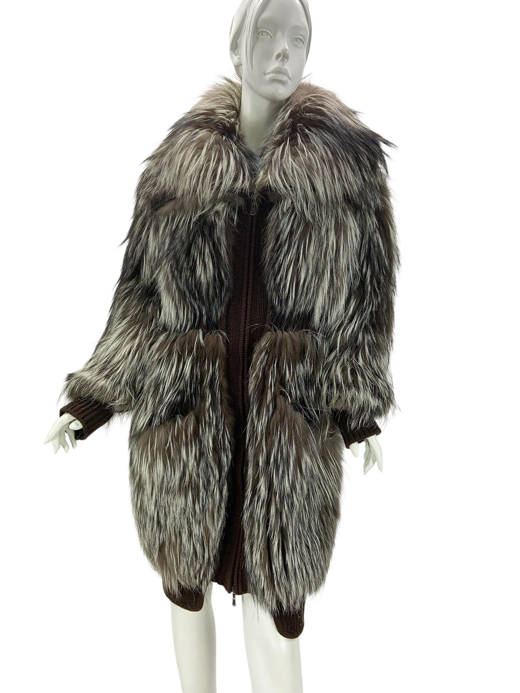 Exquisite Yves Saint Laurent luxury coat featuring plush fox fur panels combined with a rich, structured wool and cashmere body. This rare piece showcases an oversized silhouette with dramatic fox fur collar, sleeves, and panel detailing in natural