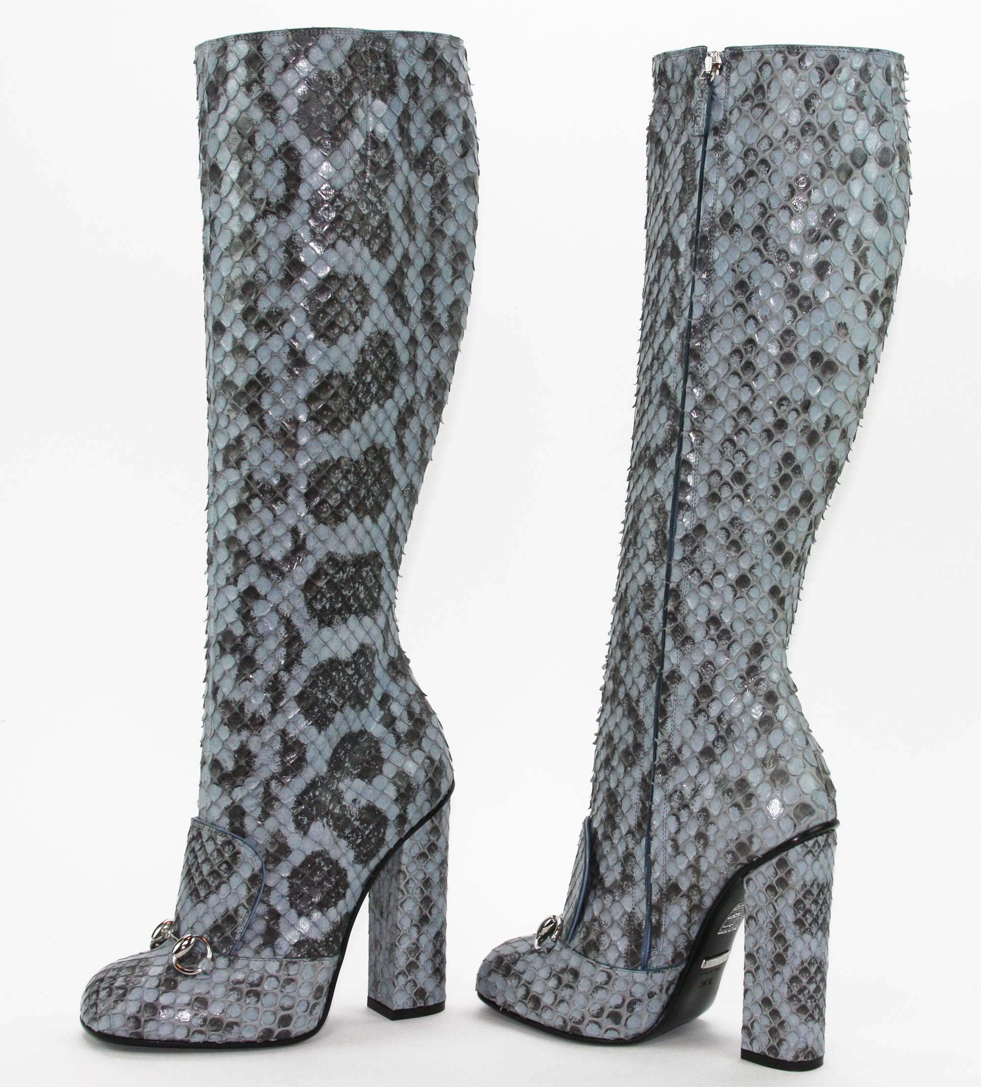 Cut Slim to Showcase Your Legs, the Season's Must-Have Boots Breathe Retro-Tinged Sophistication with Precious Candy-Colored Python and a Chic Stacked Heel.
 
New GUCCI PYTHON Knee Height Boots
Italian Size 36.5 – US 7
Designer Color -