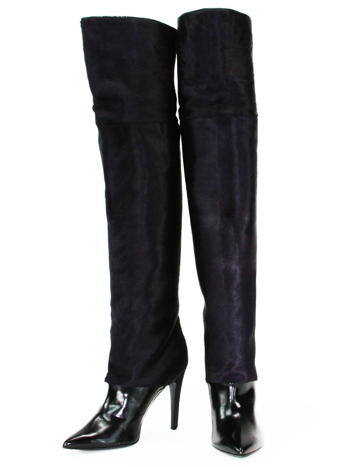 New PIERRE HARDY Over the Knee Combo Boots
Italian Size 39.5 - US 9
Color - Black Leather, Dark Purple Fur
Leather and  Pony-Hair
Pointed Toe
Leather Lining and Sole
Covered Pony-Hair Heel - 4 inches ( 10 CM )
Pull On Style
Made in Italy
Retail