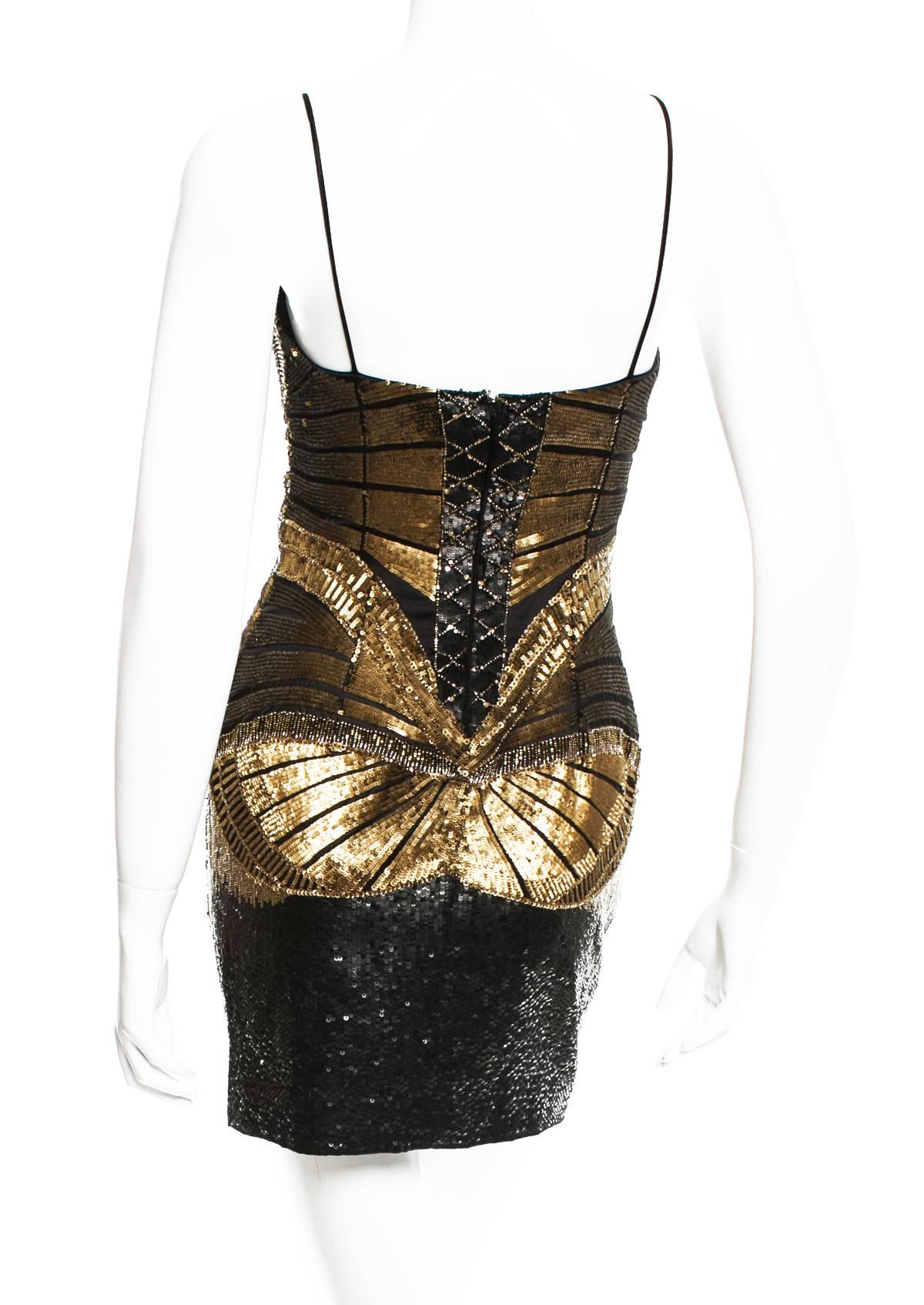 New ROBERTO CAVALLI Fully Embellished Mini Dress
Italian Size 40 - US 4
Fully Embellished with Gold-Tone, Black Beads and Sequins
100% Silk, Corset Insert
Fully Lined, Back Zip Closure
Measurements: Length - 31 inch, Waist - 26 inches, Hip - 34