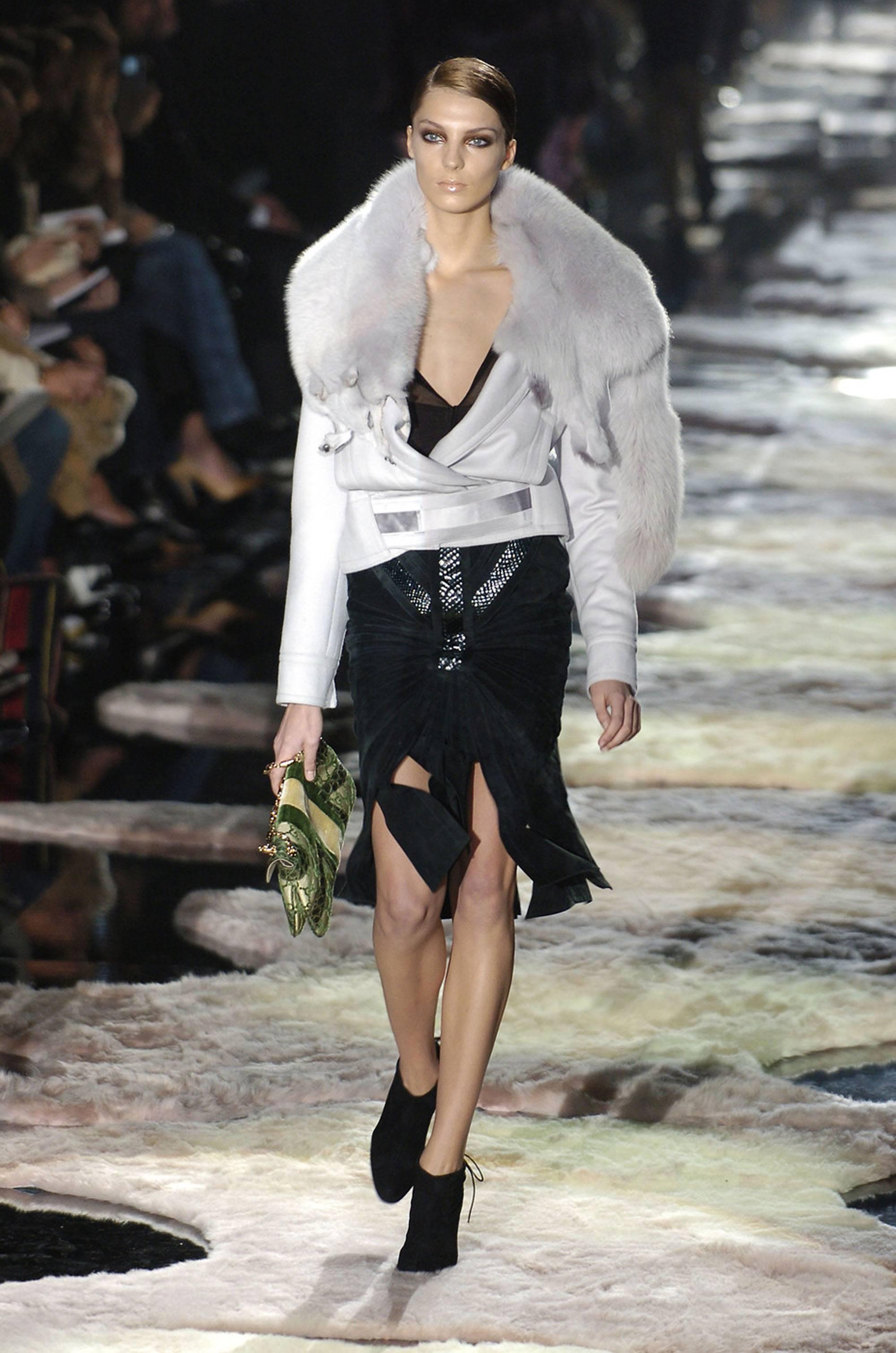 Tom Ford for Gucci Jacket with Fox Fur - Matching runway suede skirt with python available in size M.
F/W 2004 Collection
Italian size 42 - US 6
90% Wool, 10% Cashmere.
Dyed Fox Fur Attached Collar
Dove grey.
Two Front Pockets.
Made in