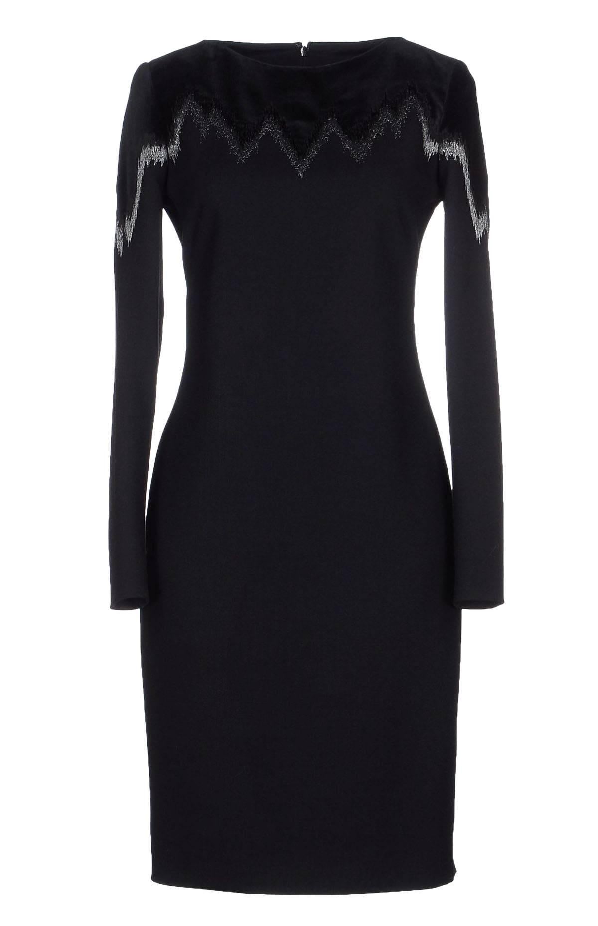 Nuovo abito di classe in lana nera Emilio Pucci
Taglia italiana 46 - US 10/12
Seta nera e ricami metallici in tonalità argento
Carré in velluto
Chiusura con zip sul retro
61% Lana, 17% Cotone, 12% Poliammide, 6% Seta, 4% Elastam
Completamente