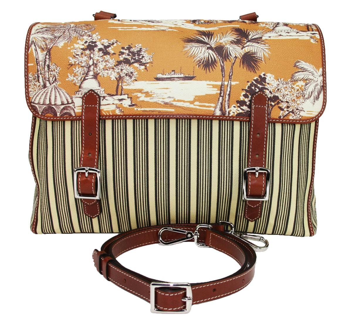 Rare ETRO Satchel Messenger Handbag
Colors – Harvest Orange, Black and Cream Stripes
Material – Coated Canvas and Leather
Hardware Color – Silver
Tropical Setting Images of Palm Trees and Ship
Several Pockets
Orange Lining
Removable and Adjustable