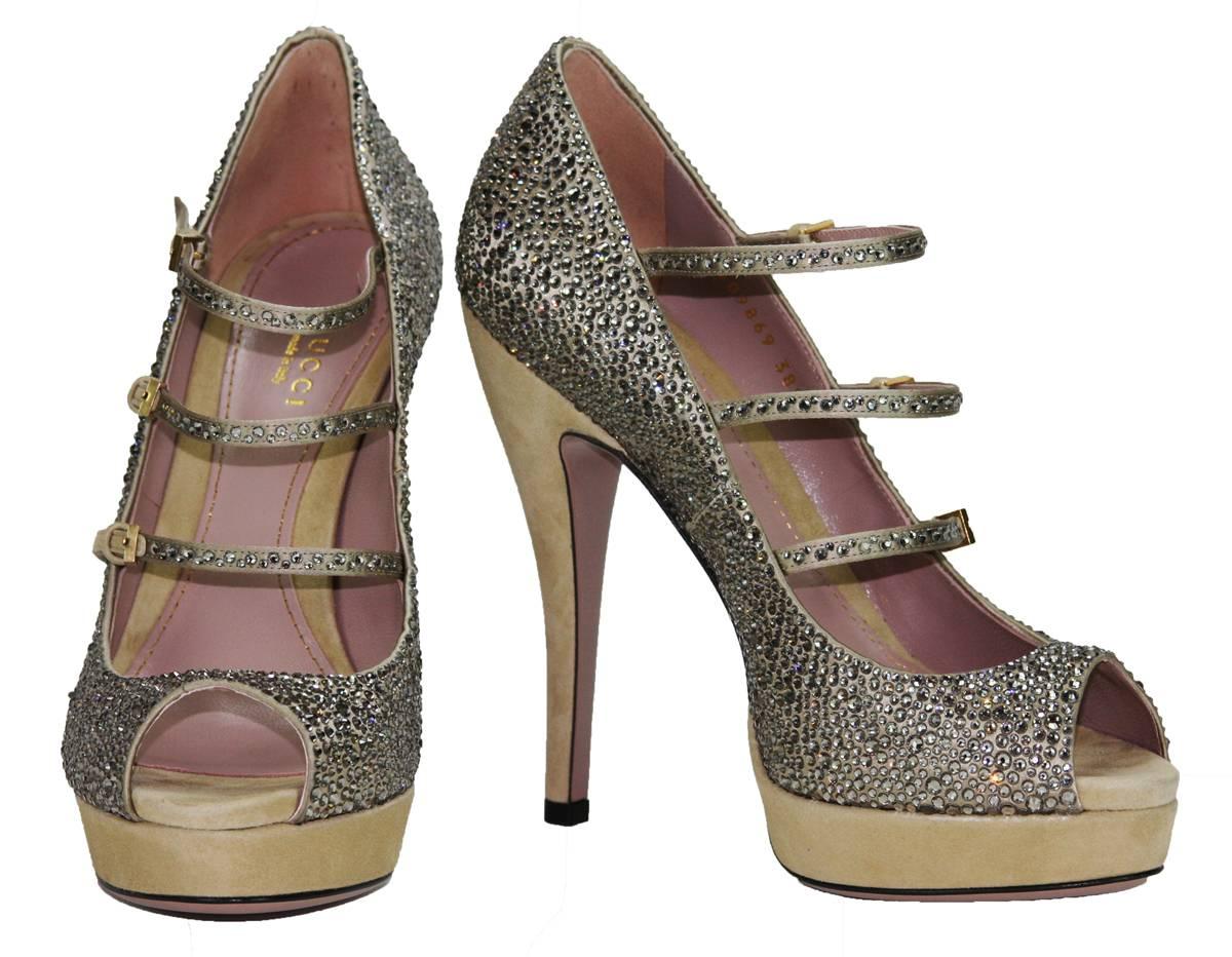 New GUCCI Lisbeth Crystal High Heel Pump Shoes
Italian Sizes Available 38.5 and 39.5 - US 8.5, 9.5
Clear Crystals Applied to Satin
Mary Jane Style Straps
Beige Suede Covered Heel and Platform
Gold Tone Buckle, Peep Toe
Heel Height – 5.5