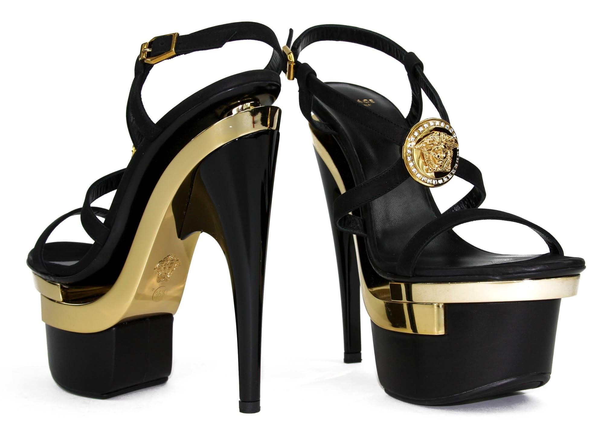 New Versace Triple Platform Strap Sandals
Sizes Available - 35.5, 37, 37.5, 38, 38.5, 39, 39.5, 40, 40.5, 41.
Colors - Gold and Black
100% Leather
Swarovski Crystals Gold Medusa 
Leather Lining 
Leather Sole
Heel Height - 6.5