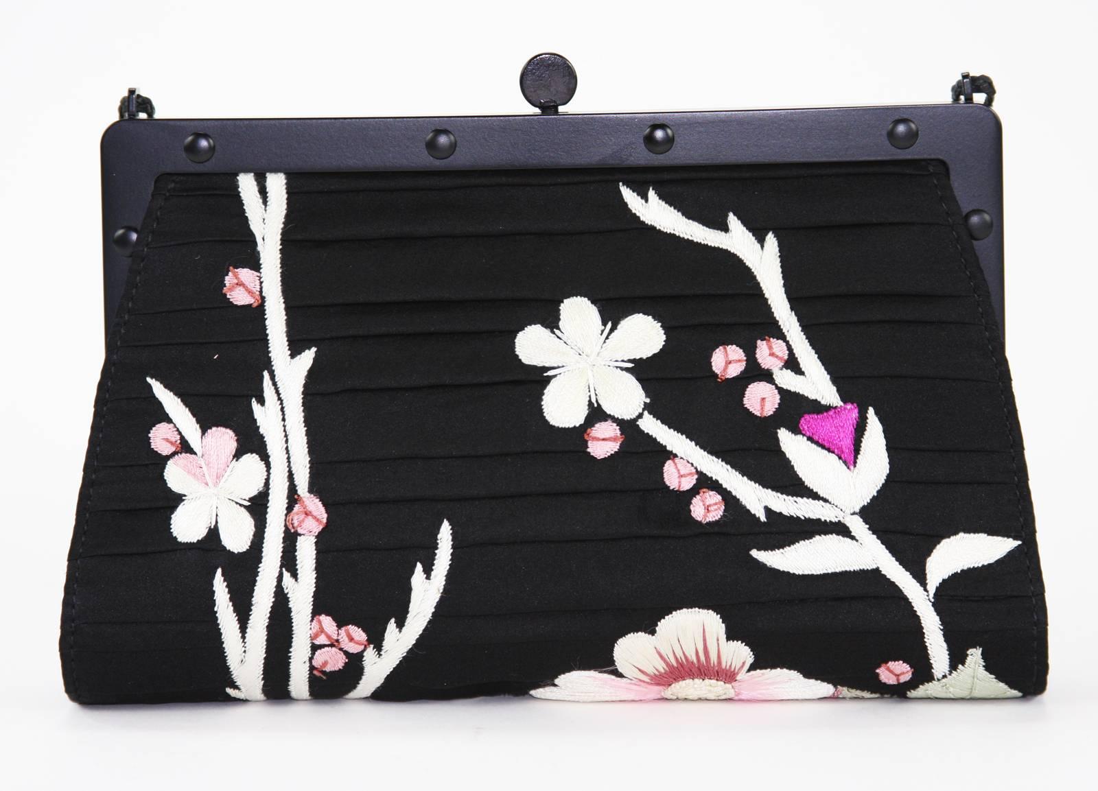 Tom Ford for Gucci Japanese Flowers Black Silk Frame Bag Clutch 
S/S 2003 Collection
100% Silk, Leather
Floral Japanese Embroidery in Pink, White, Soft Green, Burgundy.
Frame-Shaped Opening, Snap Lock for Closure
Matte Black Hardware, Leather