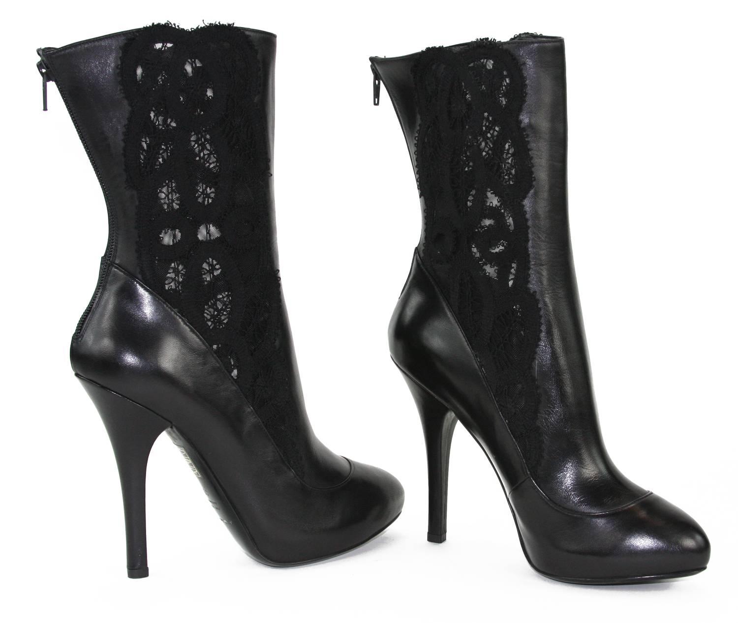 When creating the perfect outfit, always start off on the right foot with a pair of stunning boots from Dolce & Gabbana.
Dolce & Gabbana Black Lace inset Leather Platform Boots
Italian size 39 - US 9
Color - Black
Smooth Leather and Lace