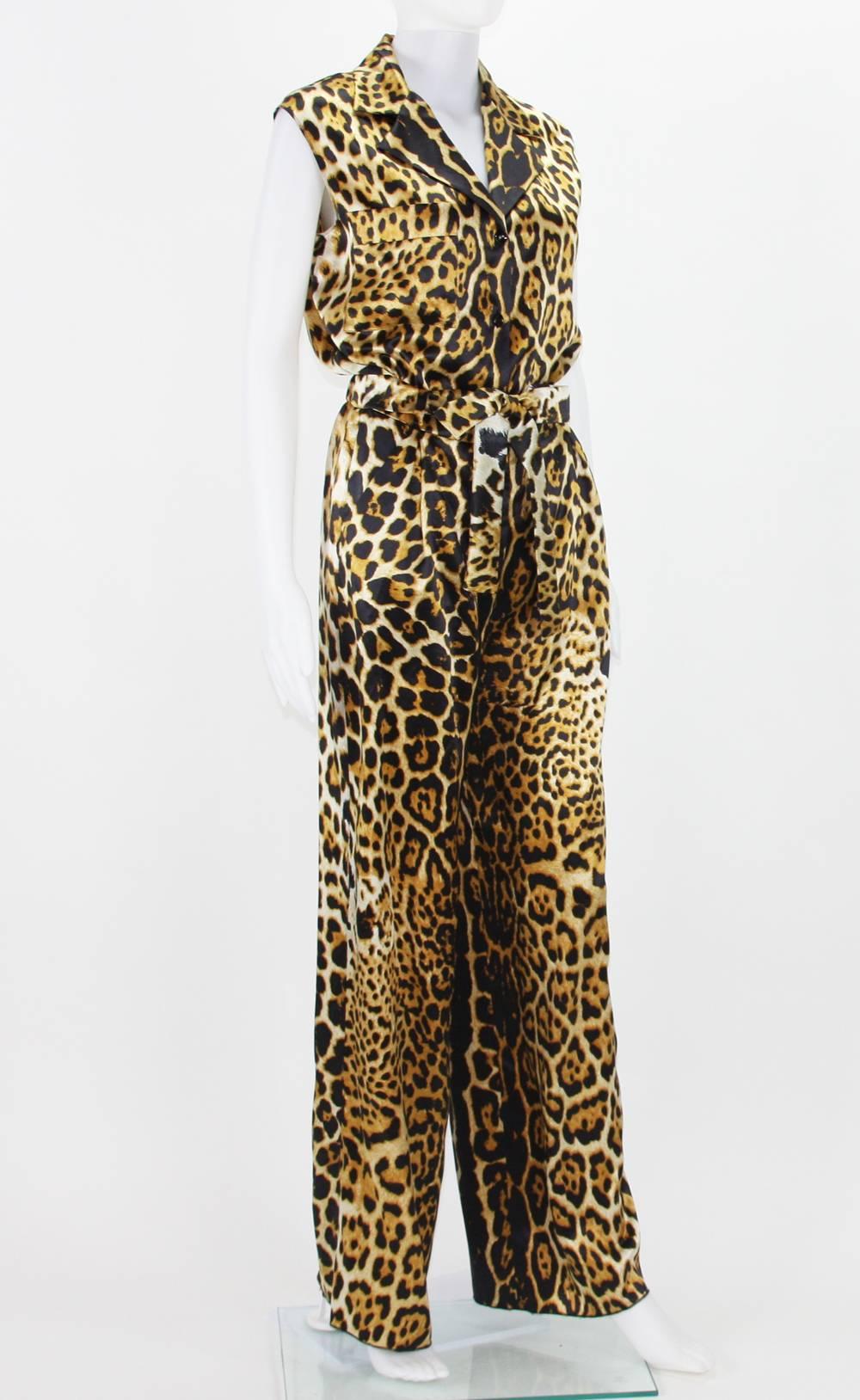 Yves Saint Laurent Silk Leopard Print Jumpsuit
Fr. size 36 - US 4
100% Silk
Buttons Closure Top, Zip Closure Pants
Attached Belt, Two Side Deep Pockets, Unhemmed
Measurements: Length - 62 inches, Bust - 36/37, Waist - 27/28 + stretch.
New without