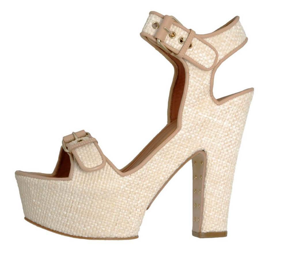 Luxurious Sandals - A Dream Shoes for the  Summer 
Italian Size 39 - US 9
Looks Classy and Elegant , and Cool - Thanks to the Raffia Look !
The Key is the Soft, Groove-Shaped Foot-Bed , Which Makes the Shoes Nice and Comfortable to Wear.
Color -