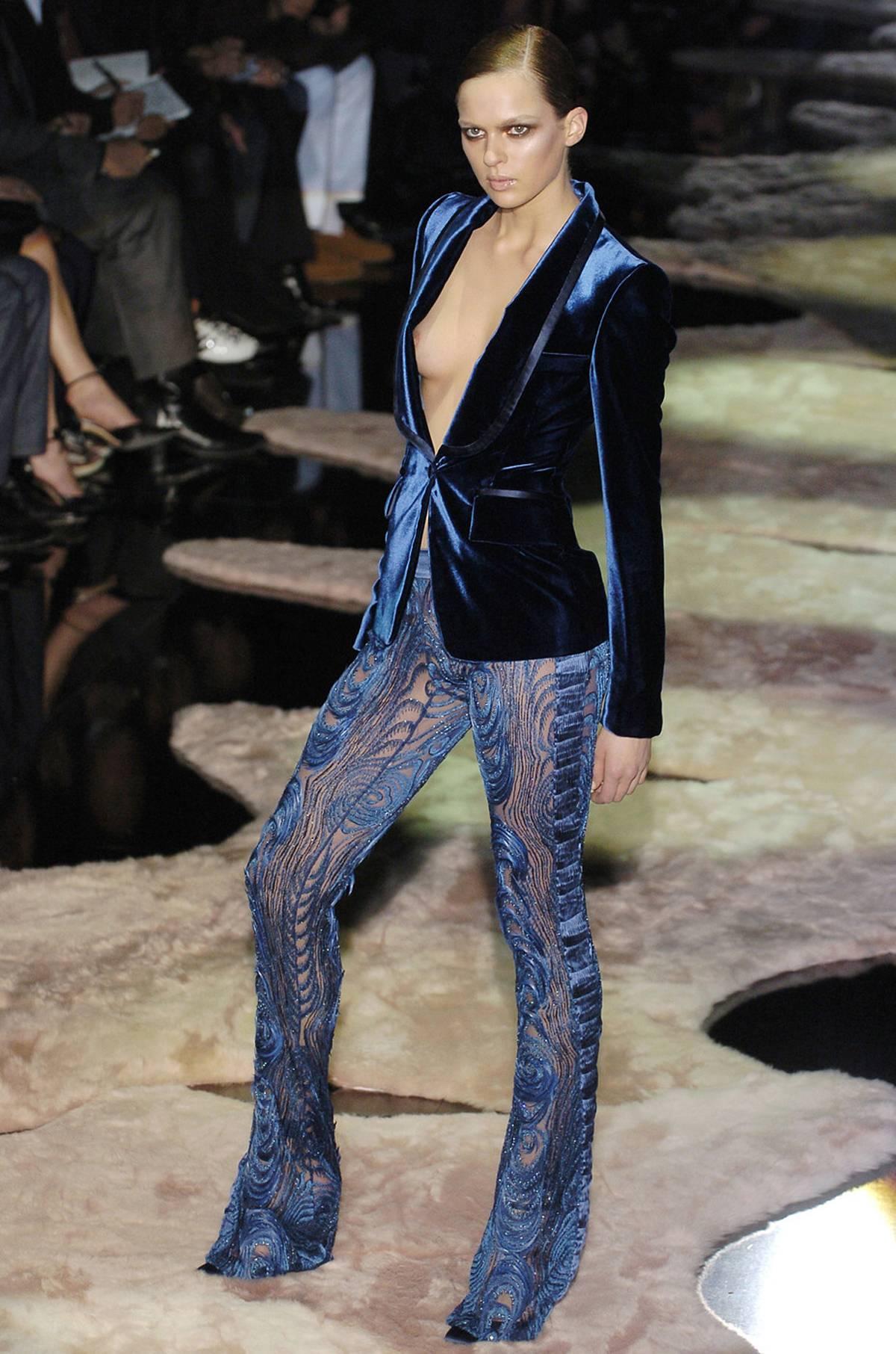 Tom Ford for Gucci Iconic Blue Peacock Feather Sequin Embroidered Lace Pants
F/W 2004 Collection
Italian Size - 40
Fully Beaded, Purple Feather Embellished, Detachable Panties, Stretch.
The same pants that Liberty Ross wore to Tom Ford's