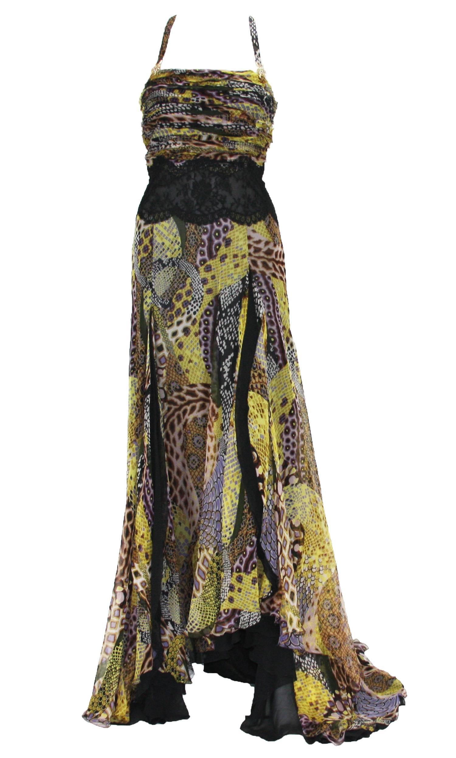 Versace 2005 Collection Silk Snake Print Dress Gown
Italian size 44 - US 8
Sheer Lace Waist, Gold Tone Metal Medusa Decoration
Fully Lined in Black Silk, Side Zip Closure
Two Front Sexy Splits to Show-off Beautiful Legs
Measurements: Length - front