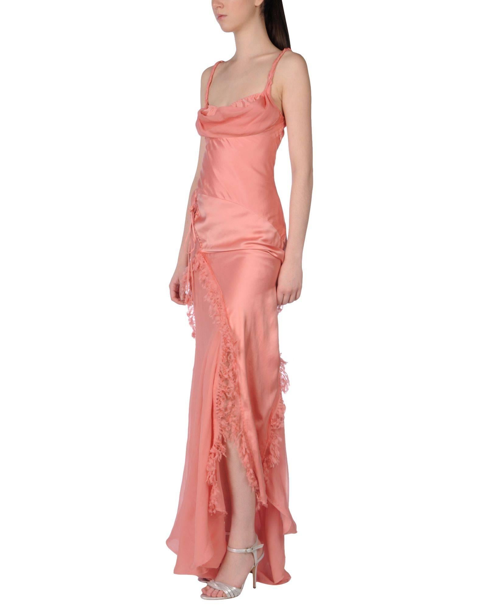 New ERMANNO SCERVINO Silk Ruffle Dress Gown
Italian size 42 - US 6
Open Back Style, High Front and Back Slits
100% Peach Color Silk
Made in Italy
New with tag.
