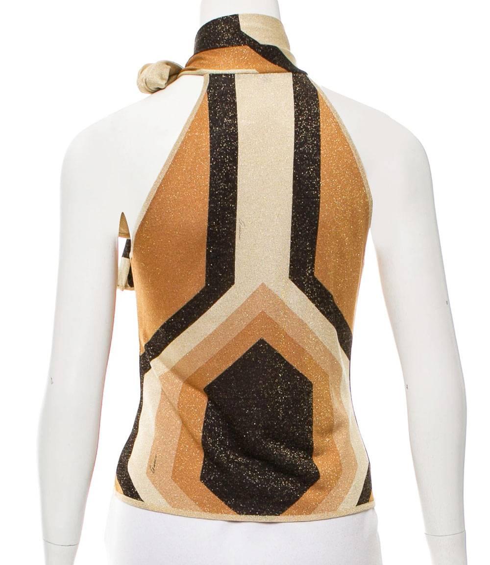 Tom Ford for Gucci Metallic Kaleidoscope Top
F/W 2000 Collection
Sizes XS and L available
Scarf Tie Halter Style
Measurements: 
Size XS : Length - 19 inches, Bust - 32. 
Size L : Length - 22