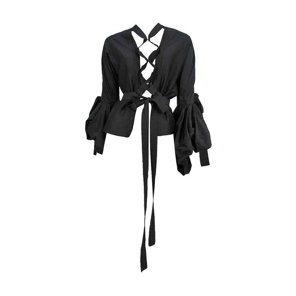 Tom Ford for Yves Saint Laurent Iconic Lace Up Top Blouse
F/W 2002 Collection
French size 40
Light Weight Black Cotton/Silk Blouse 
Oversize Balloon Sleeve with Bow and Open Side
Extra Long Tie Closure at Front
Made in Italy
Excellent Condition (