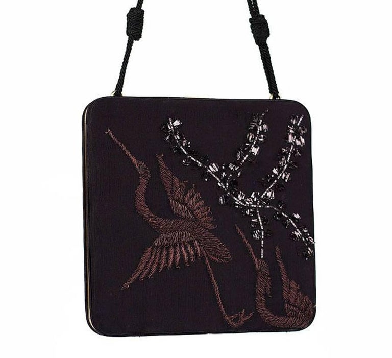 Tom Ford for Gucci Embroidered Limited Edition Clutch
S/S 2003 Collection
Black Silk Framed Clutch with Brown Chocolate Embroidery Birds
Dual braided shoulder straps, crystal and embroidered accents throughout exterior, tonal satin lining and