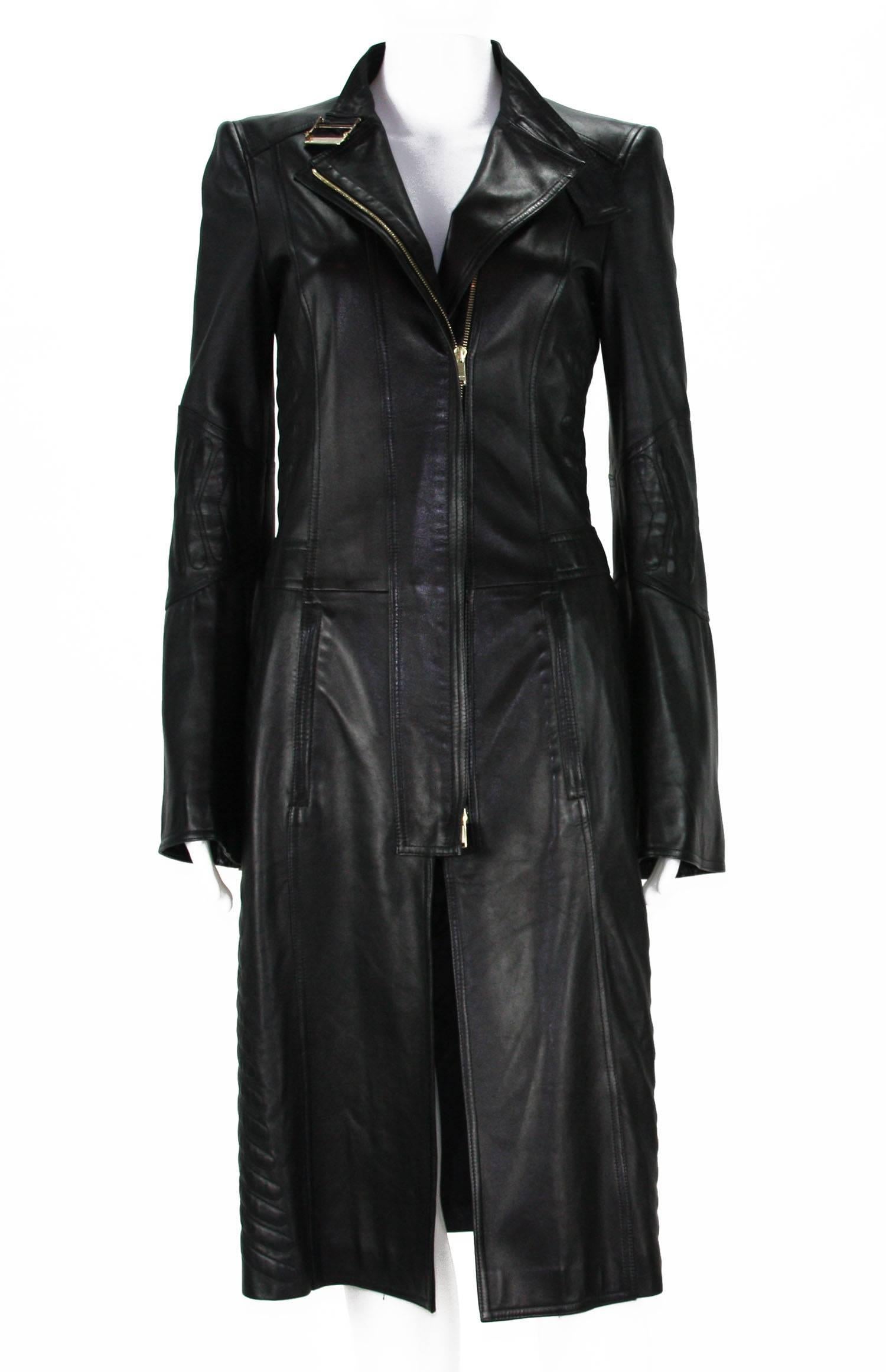 Rare TOM FORD for GUCCI Collectible Coat
2004 Collection
Italian Size 40 – US 4
100% Soft Leather - Color Black, Top Stitching Around - Chevron Quilting, Front Double Snap Closure.
Two Side Pockets with Zippers, Zip Cuffs on Sleeves, Fully Lined,