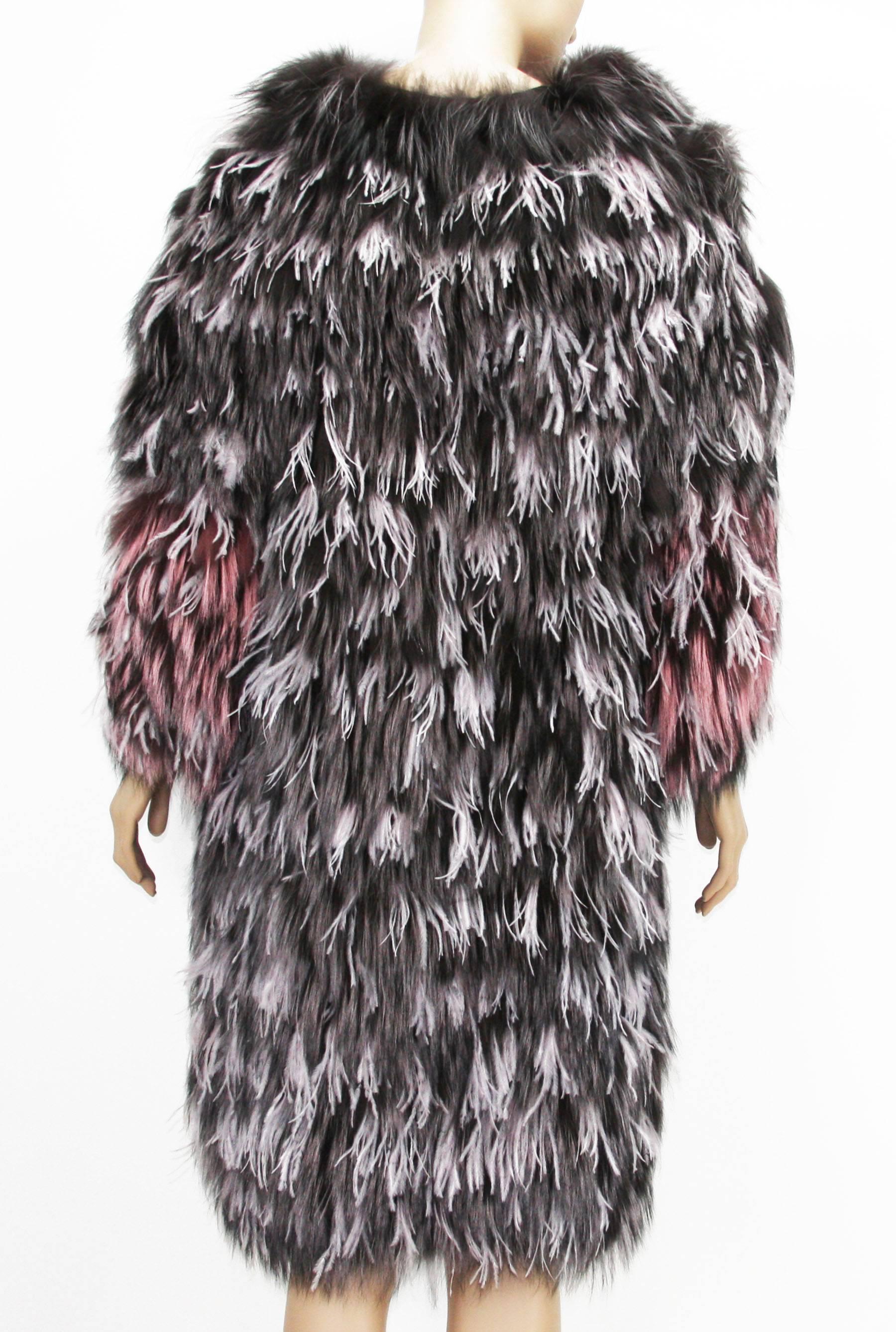 Oscar de la Renta Feathers and Fox Fur Evening Coat Jacket.
Black/Gray Fox fur, Soft Pink and Pink Ostrich Feathers.
Very light evening coat. Hook-and-eye closure, dual slit pockets, fully lined.
Measurements: Length - 40 inches, Bust - up to