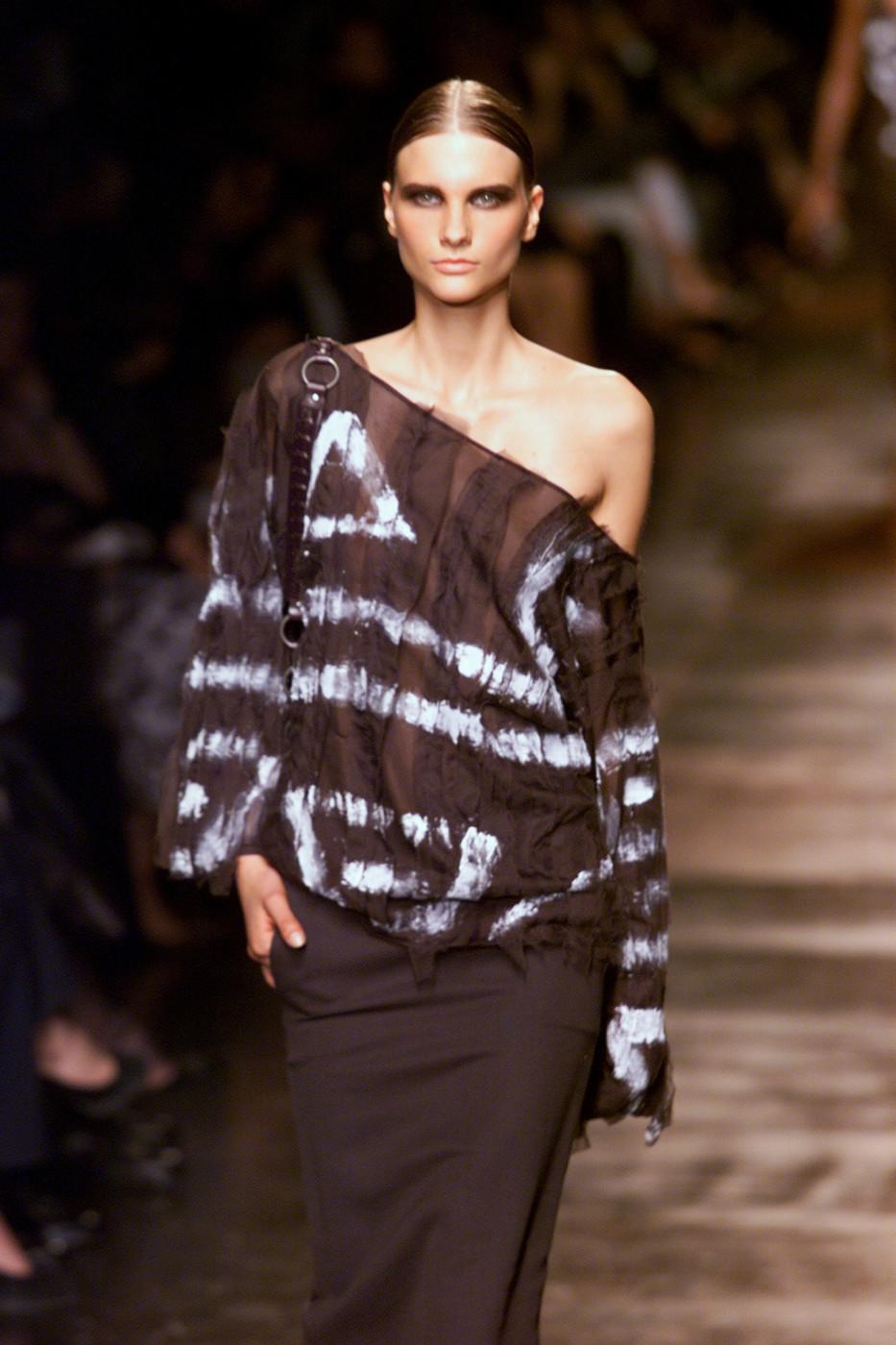 Tom Ford for Yves Saint Laurent Rive Gauche Semi-Sheer Sexy Top - Rare to Find!
Spring/Summer 2002 Collection
Designer size - M
100% Silk, Dark Brown, Unique Hand-Painted Design, Silk Painted Distressed Panels Over the Semi-Sheer Stretch Knit, Slip