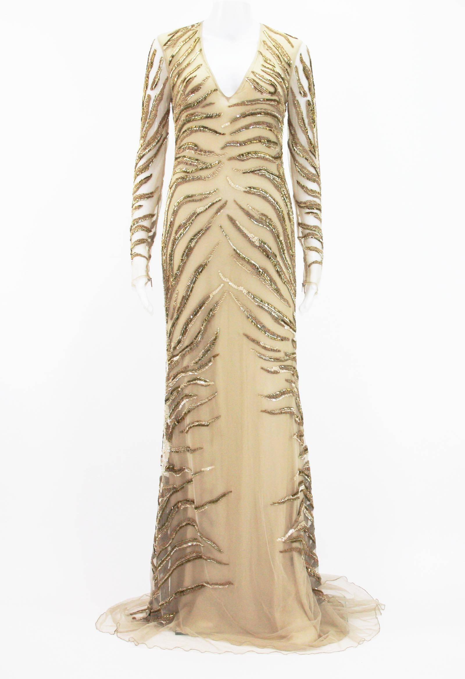 New Roberto Cavalli Nude Beaded Embroidery Mesh Dress Gown 
Designer size 40, Color - Desert.
Fully Beaded in Gold and Silver tone Beads and Nude tone Sequins over the Mesh, Fully Lined - 100% Silk, Back size zip closure, Stretch.
Measurements: