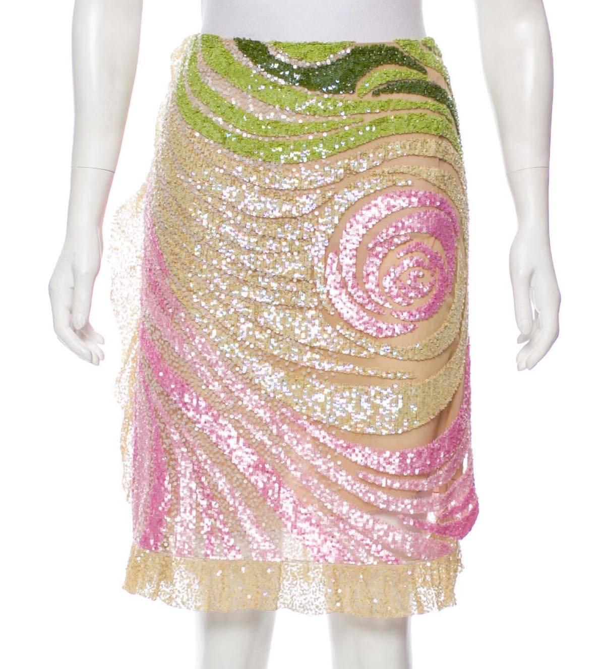Valentino Sequin Embellished Knee Length Tulle Skirt 
Designer size 6
Soft Pink and Green Sequins Embellishment Over the Tulle, Fully Lined, Ruffle Accent on Side and Hem, Side Vent.
Measurements: Length - 23 inches. Waist - 30.
Made in