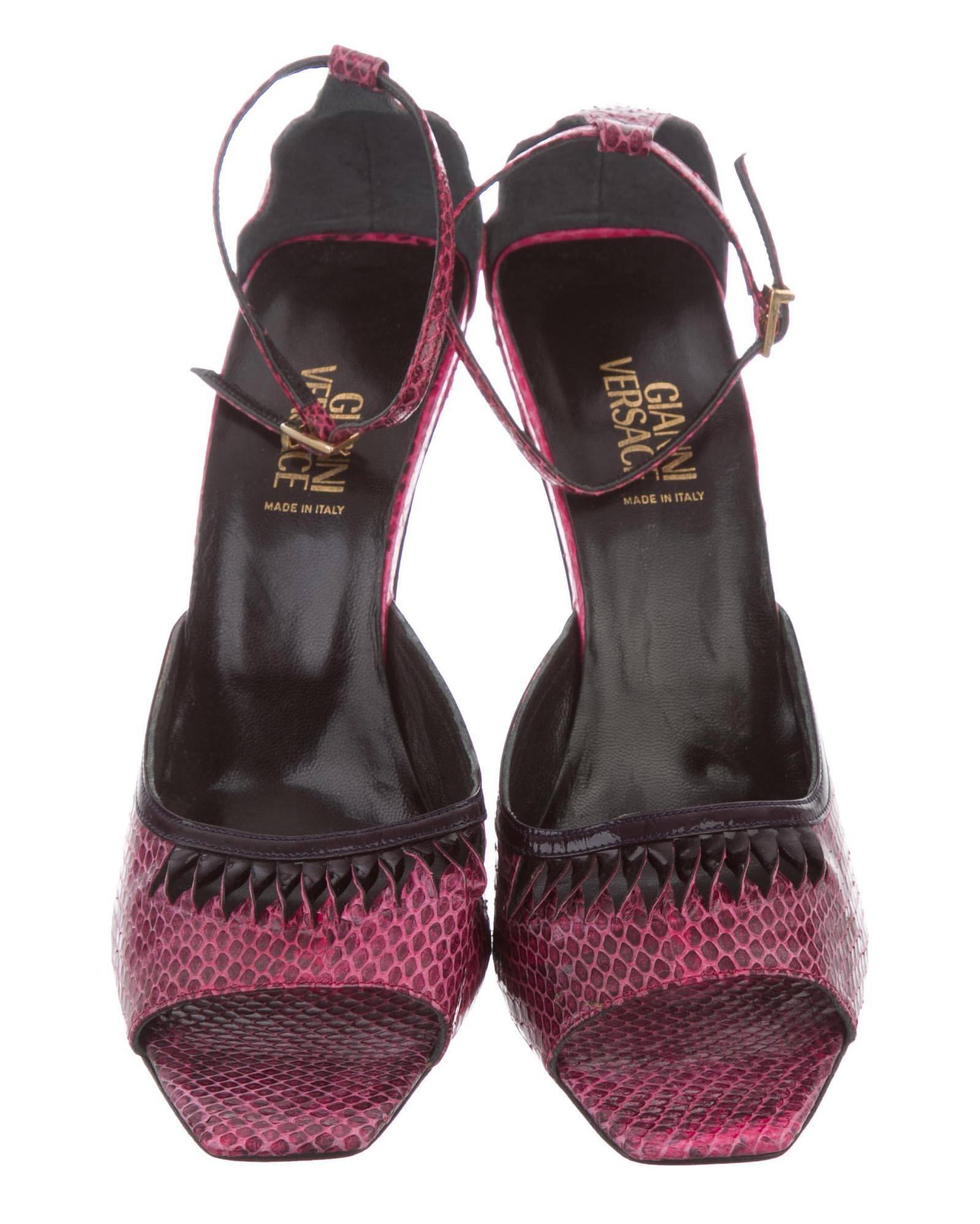 Gianni Versace Vintage Snakeskin Peep-toe Raspberry Sandals
F/W 2000 Runway Collection
Designer size 39.5 - US 9.5
Snakeskin, Patent Leather Trim, Gold-tone Buckle Closures at Ankle Straps, Leather Sole with Medusa Logo.
Covered Heel - 4.5
