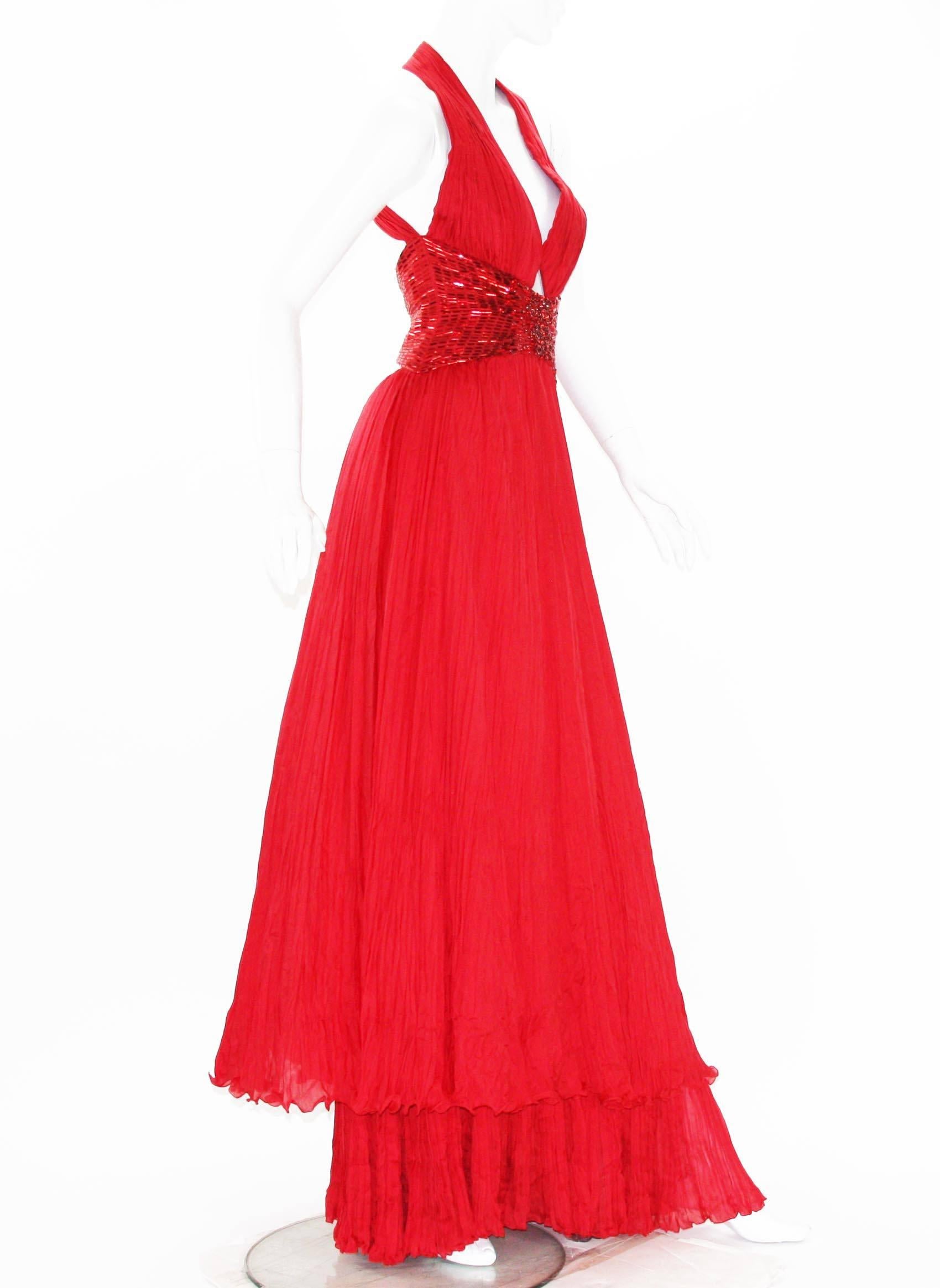 New Roberto Cavalli Red Silk Beaded Long Dress Gown
Designer size 40
Unforgettable Marilyn Monroe Style.
100% Plisse-Silk, Double Layered, Fully Lined, Wide Build in Belt with Crystals and Sequin Embellishment.
Measurements: Length - 63 inches,