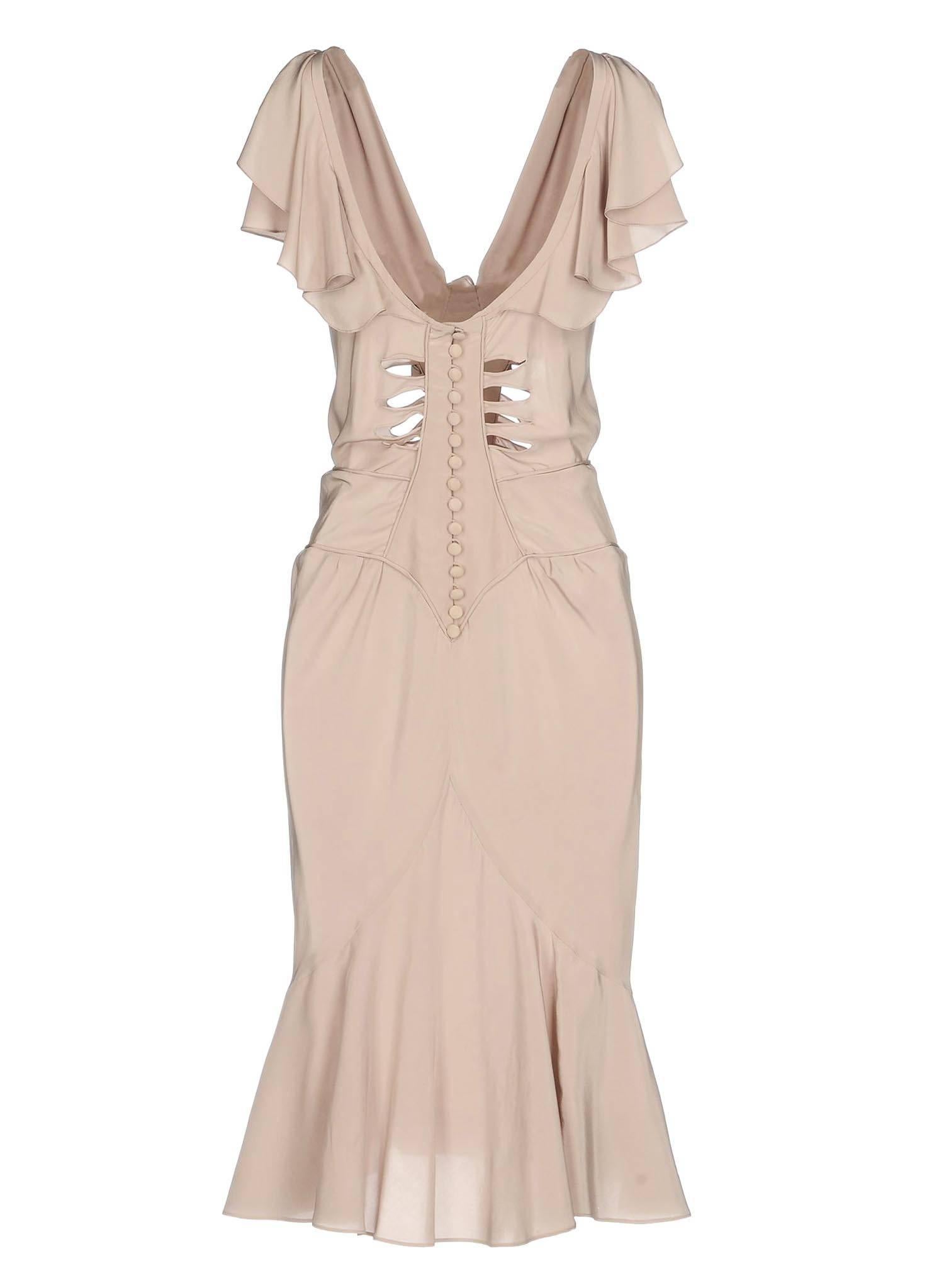 New Tom Ford for Yves Saint Laurent Rive Gauche Silk Dress
S/S 2003 Collection
French size 36 - US 4
100% Silk, Nude color with lavender shade, Cut out details, Button close at back.
Made in France
New with tag.
