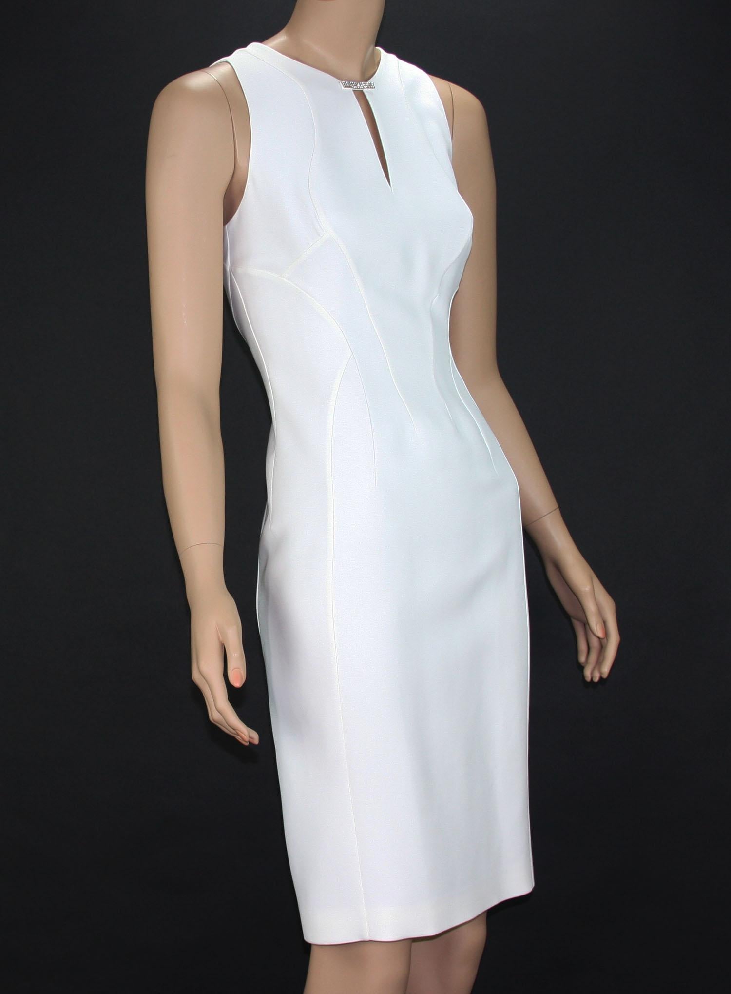 New Versace Elegant White Cocktail Dress 
Designer size 40 - US 6
100% Silk, Swarovski Crystals Detail, Fully Lined, Back Zip Closure.
Measurements: Length - 39 inches, Bust - 34