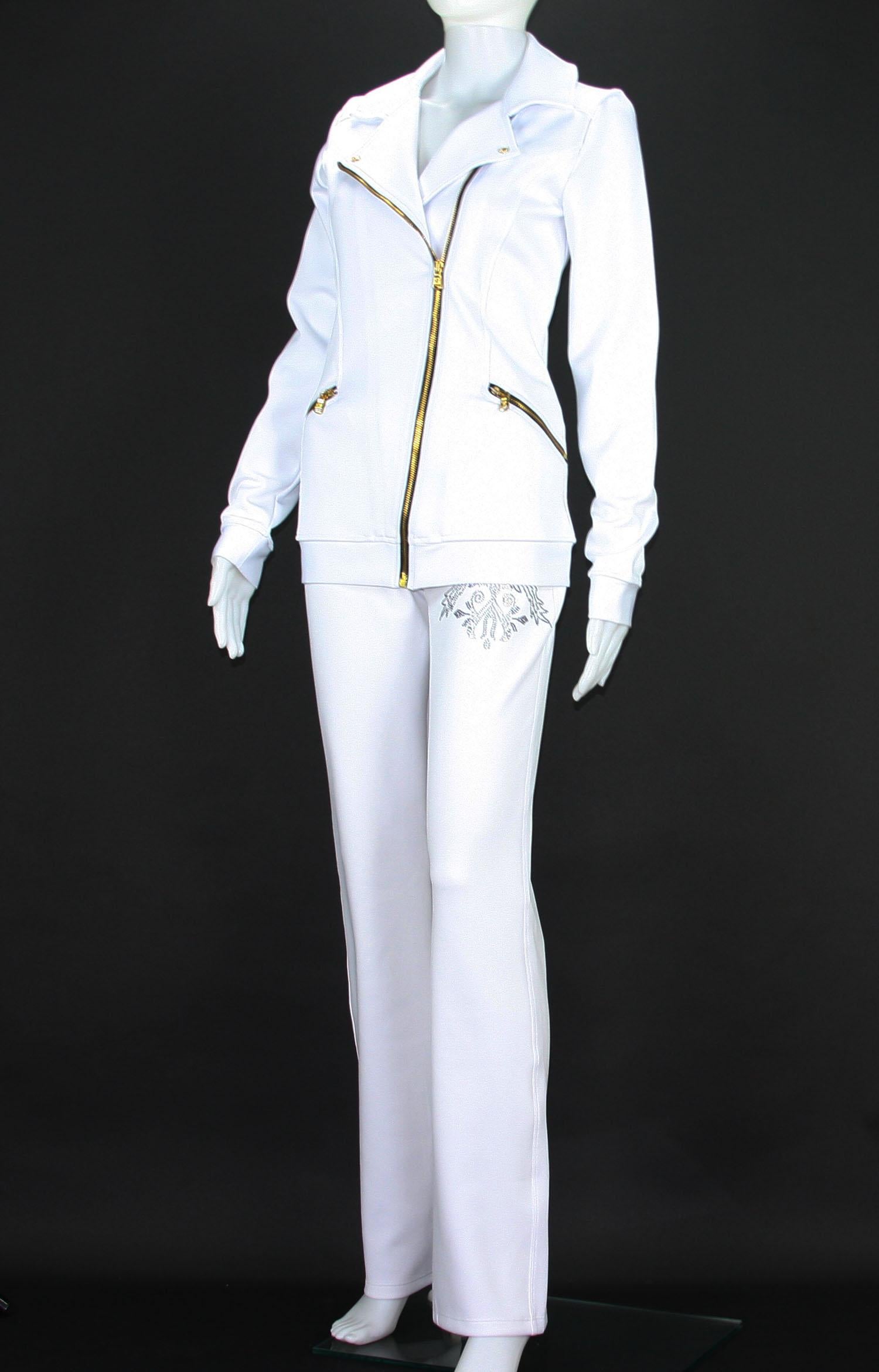 New Versace Women's Gym Pant Suit with Crystals Embellishment
Designer sizes available 3,4 - US 6,8 - It. 42,44.
Pure White Color, 87% Polyester, 13% Elastan.
Jacket - Gold Tone Zip Closure, 2 Front Deep Pockets, Gold Tone Medusa Logo, Black and