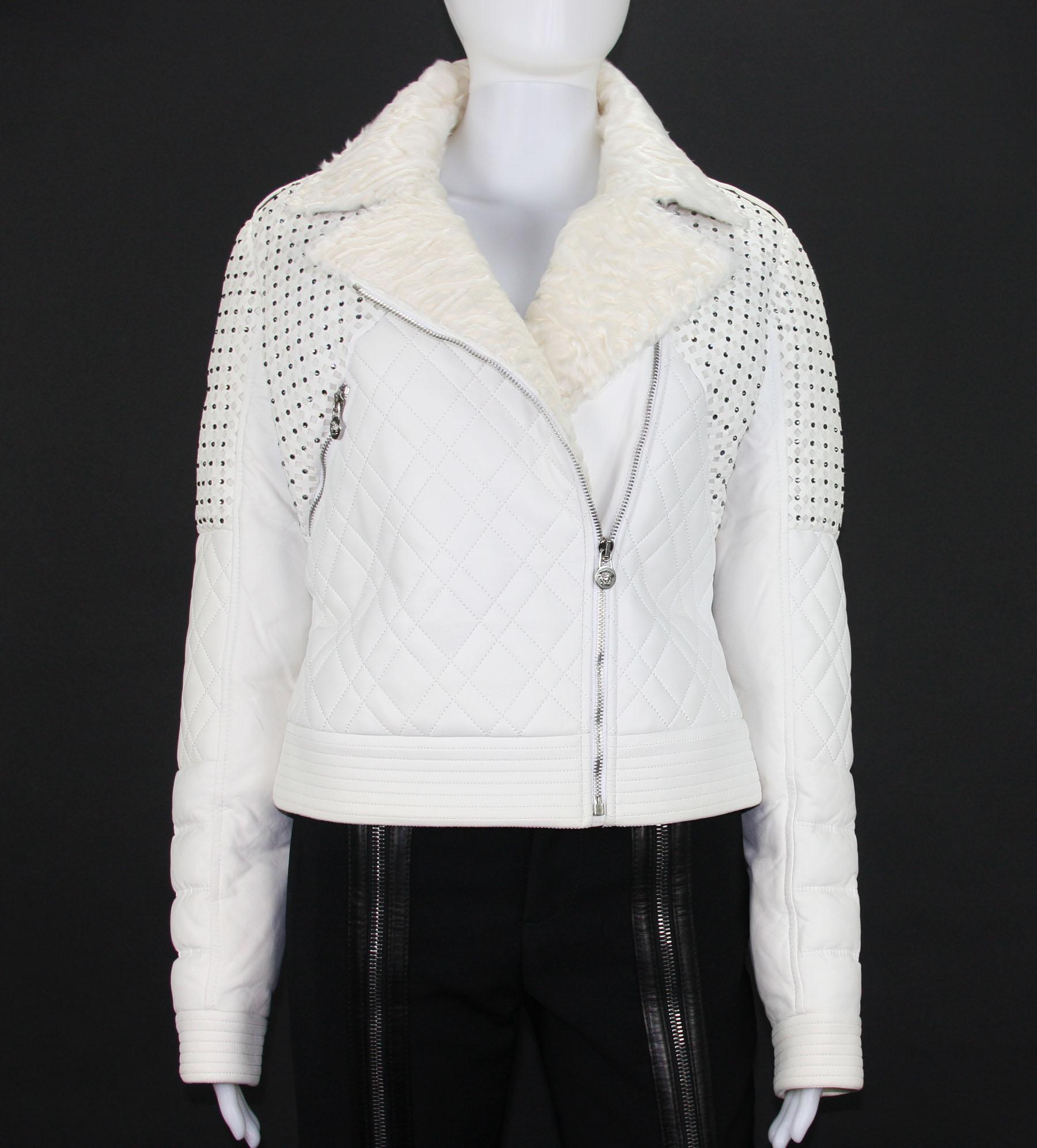 New Versace Women's White Leather Beaded Down Jacket with Fur Collar
F/W 2016 Collection
Designer size - 42
100% Lamb Skin ( Origin - Namibia), Goose Down, Persian Lamb Collar, Laser Cut Design with Swarovski Crystals, Silk Lining.
Double Breasted,