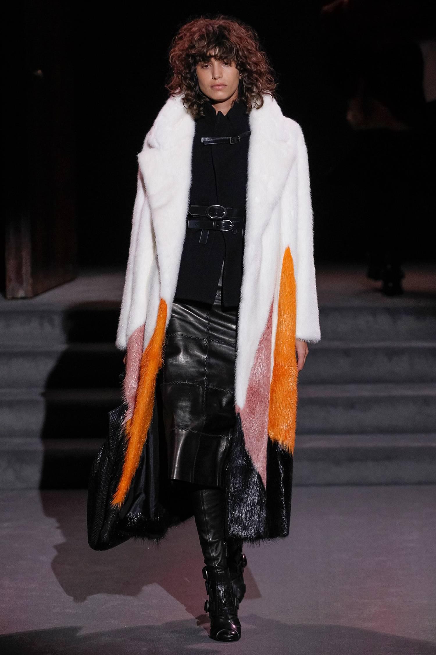 New TOM FORD triangle-pattern long coat.
Designer size - S  ( oversize style ) 
Dyed Mink (Italy) Fur and Dyed Nutria (Italy)
Colors - White, Orange, Pink, Black.
Notched collar; snap front.
Long sleeves.
Side slip pockets.
Relaxed silhouette.
Made