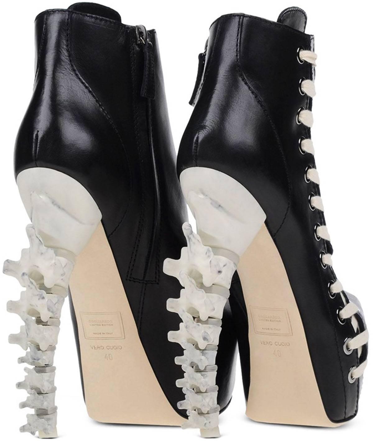 New Dsquared2 Limited Edition Icon Spine Heel Leather Ankle Booties
 Italian sizes available 39 - US 9
 Color - Black
 100% Leather
 Faux Laces Along the Side
 Zip Closure on Side
 Hidden Platform - 2 inches
 Faux Bone Heel - 6 inches
 Shaft - 5.5