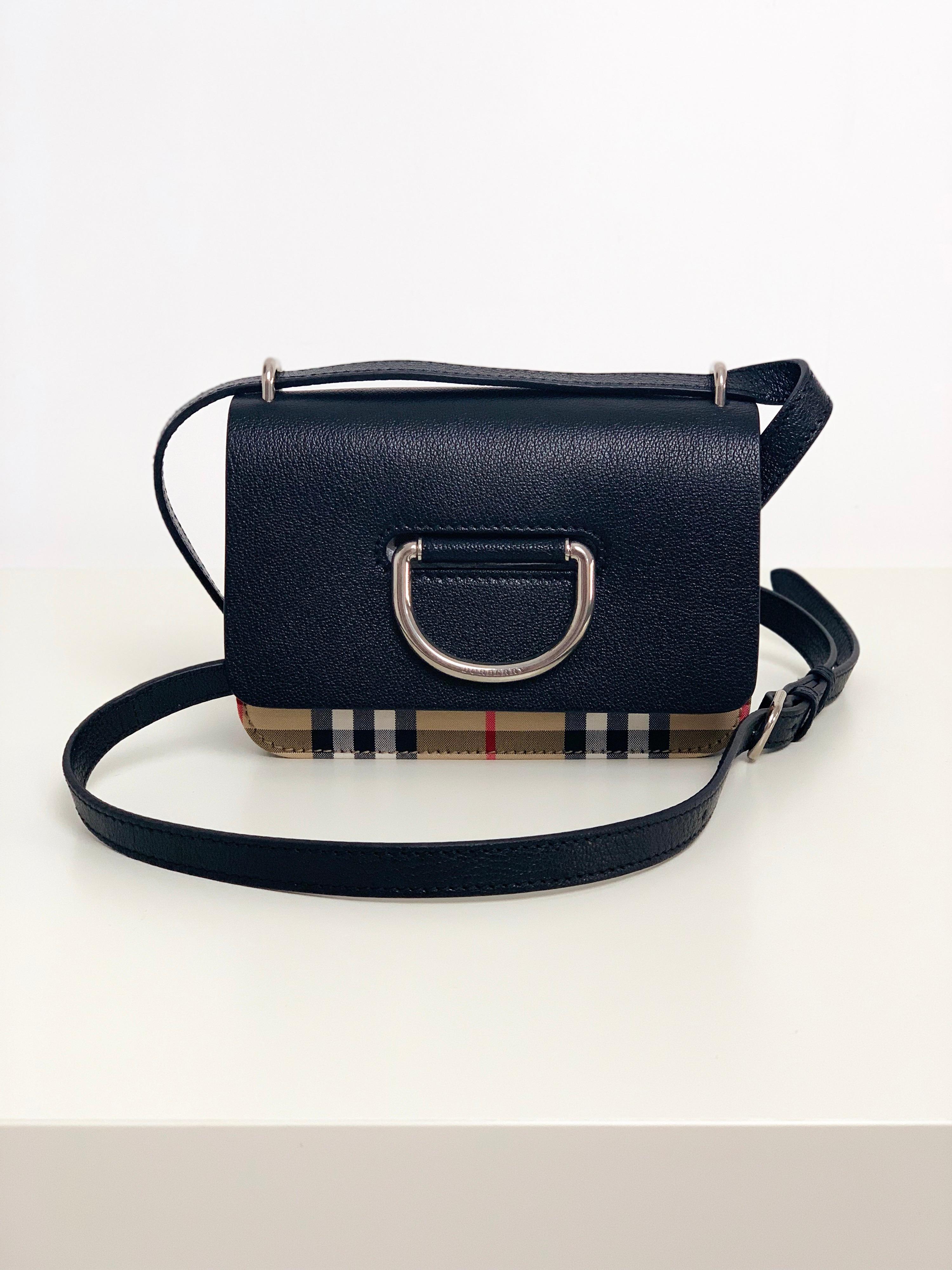 A sleek box-style bag in Vintage check and grainy leather with a distinctive D-ring fastening inspired by our signature trench. Wear it on the shoulder or adjust the strap to style as a crossbody.

17.5 x 4 x 12.5cm/6.9 x 1.6 x 4.9in
Min. strap